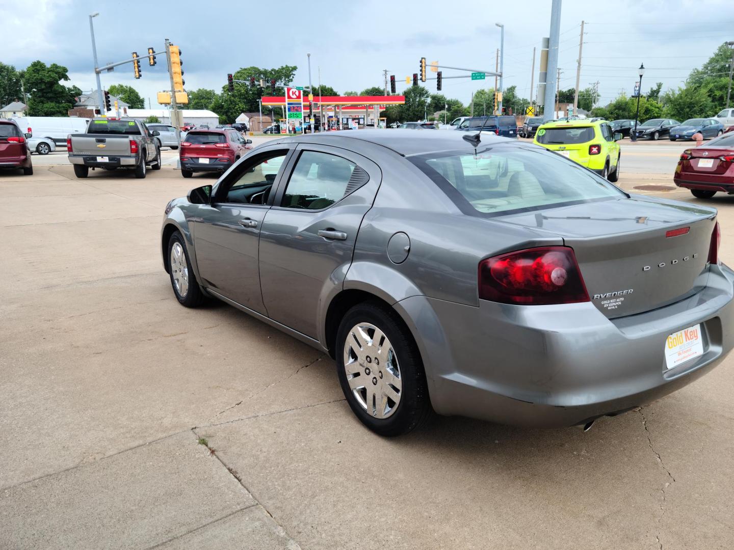 2013 Gray /tan Dodge Avenger SE (1C3CDZAG7DN) with an 3.6L V6 DOHC 24V FFV engine, 6-Speed Automatic transmission, located at 104 1st Avenue, Silvis, IL, 61282, (309) 755-9511, 41.515156, -90.425377 - Photo#2