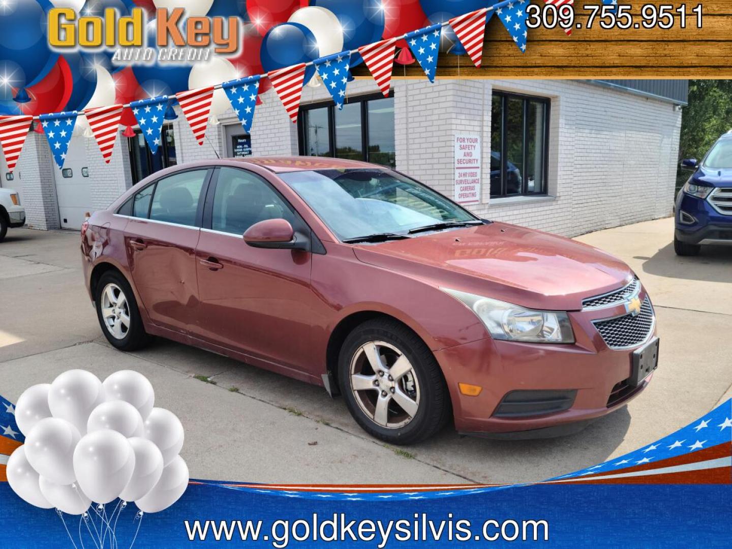 2012 Ruby Red Metallic Tinted Clearcoat /Black Chevrolet Cruze 1LT (1G1PF5SC4C7) with an 1.4L L4 DOHC 16V TURBO engine, 6-Speed Automatic transmission, located at 104 1st Avenue, Silvis, IL, 61282, (309) 755-9511, 41.515156, -90.425377- Photo#0