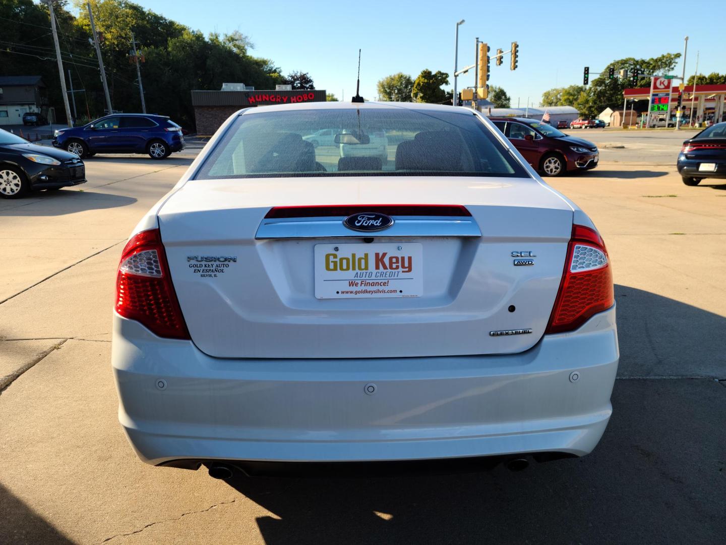 2011 White Platinum Trico /Charcoal Black Leather Ford Fusion V6 SEL AWD (3FAHP0CG4BR) with an 3.0L V6 DOHC 24V engine, auto transmission, located at 104 1st Avenue, Silvis, IL, 61282, (309) 755-9511, 41.515156, -90.425377 - All Wheel Drive! - Photo#2