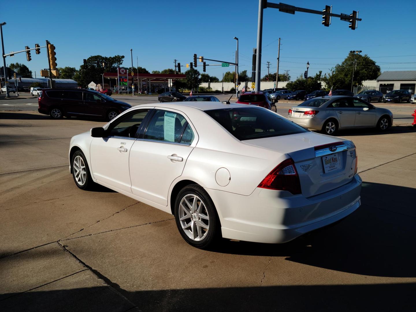 2011 White Platinum Trico /Charcoal Black Leather Ford Fusion V6 SEL AWD (3FAHP0CG4BR) with an 3.0L V6 DOHC 24V engine, auto transmission, located at 104 1st Avenue, Silvis, IL, 61282, (309) 755-9511, 41.515156, -90.425377 - All Wheel Drive! - Photo#6