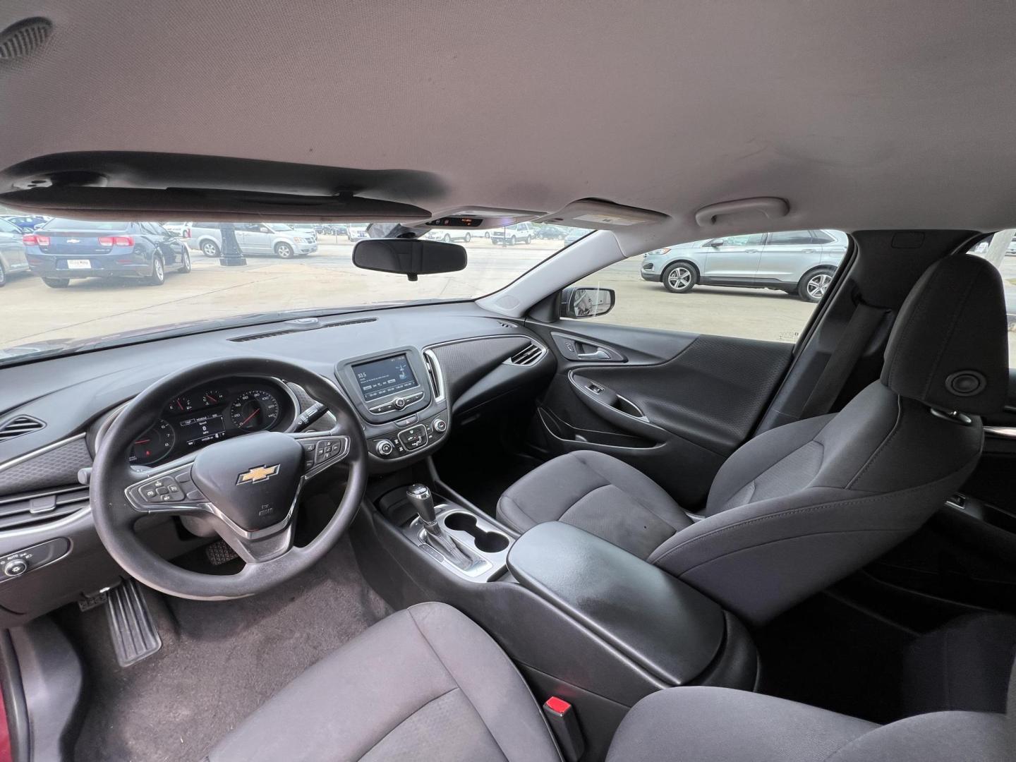 2016 Crystal Red Tintcoat /Black Chevrolet Malibu LS (1G1ZB5ST5GF) with an 1.5L L4 DOHC 16V engine, 6-Speed Automatic transmission, located at 104 1st Avenue, Silvis, IL, 61282, (309) 755-9511, 41.515156, -90.425377 - Photo#4