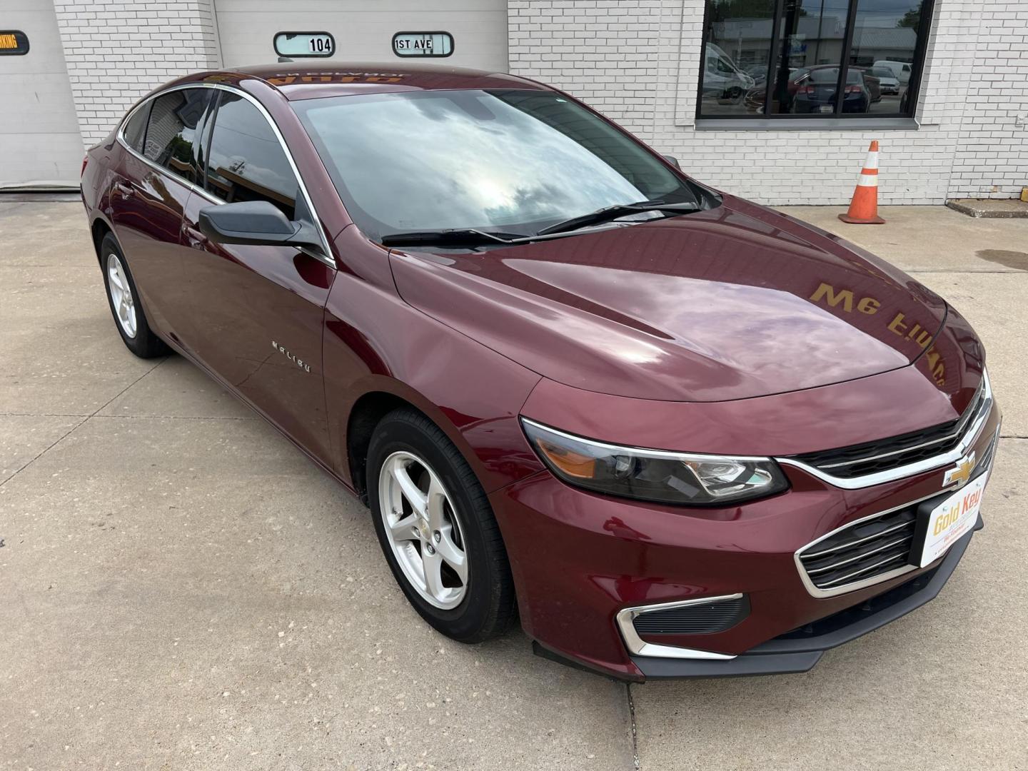 2016 Crystal Red Tintcoat /Black Chevrolet Malibu LS (1G1ZB5ST5GF) with an 1.5L L4 DOHC 16V engine, 6-Speed Automatic transmission, located at 104 1st Avenue, Silvis, IL, 61282, (309) 755-9511, 41.515156, -90.425377 - Photo#1