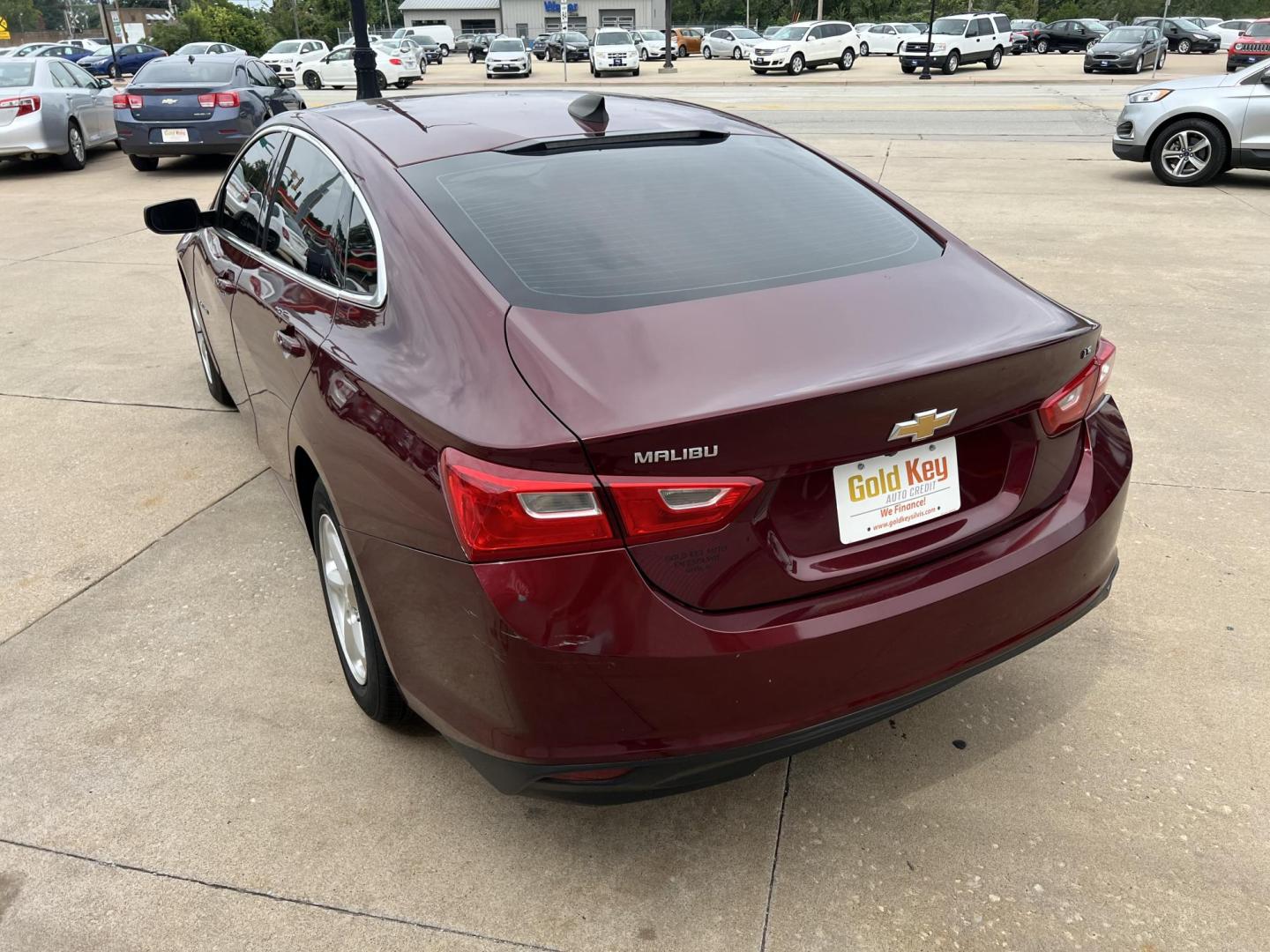 2016 Crystal Red Tintcoat /Black Chevrolet Malibu LS (1G1ZB5ST5GF) with an 1.5L L4 DOHC 16V engine, 6-Speed Automatic transmission, located at 104 1st Avenue, Silvis, IL, 61282, (309) 755-9511, 41.515156, -90.425377 - Photo#2