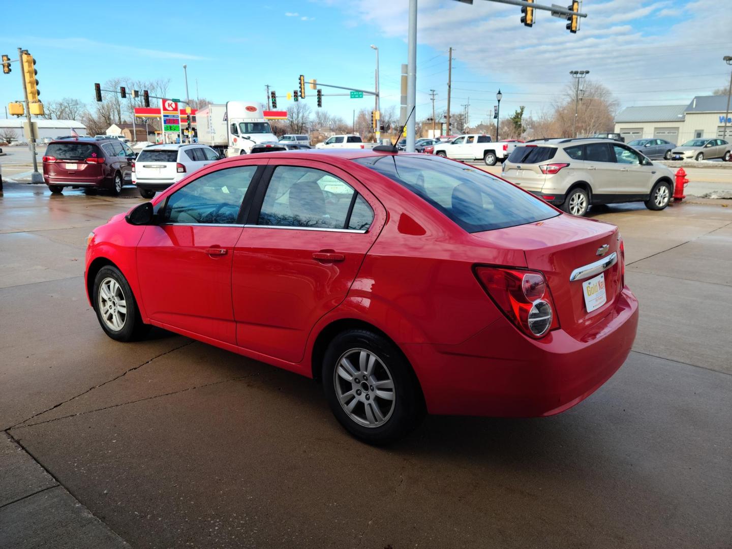 2015 Red Hot /Jet Black/ Brick Chevrolet Sonic LT Auto Sedan (1G1JC5SG3F4) with an 1.8L L4 DOHC 24V engine, 6-Speed Automatic transmission, located at 104 1st Avenue, Silvis, IL, 61282, (309) 755-9511, 41.515156, -90.425377 - Photo#2