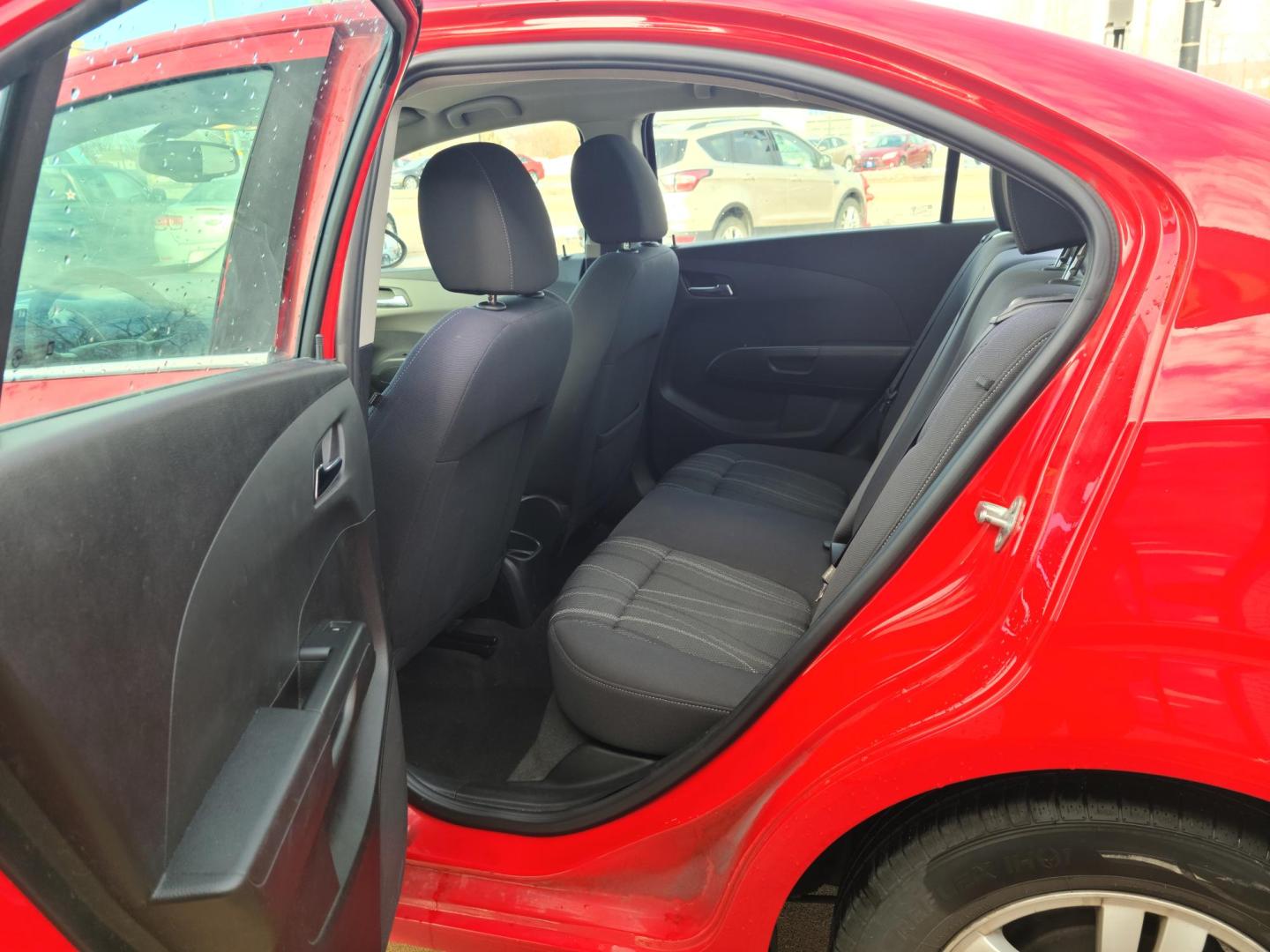 2015 Red Hot /Jet Black/ Brick Chevrolet Sonic LT Auto Sedan (1G1JC5SG3F4) with an 1.8L L4 DOHC 24V engine, 6-Speed Automatic transmission, located at 104 1st Avenue, Silvis, IL, 61282, (309) 755-9511, 41.515156, -90.425377 - Photo#5