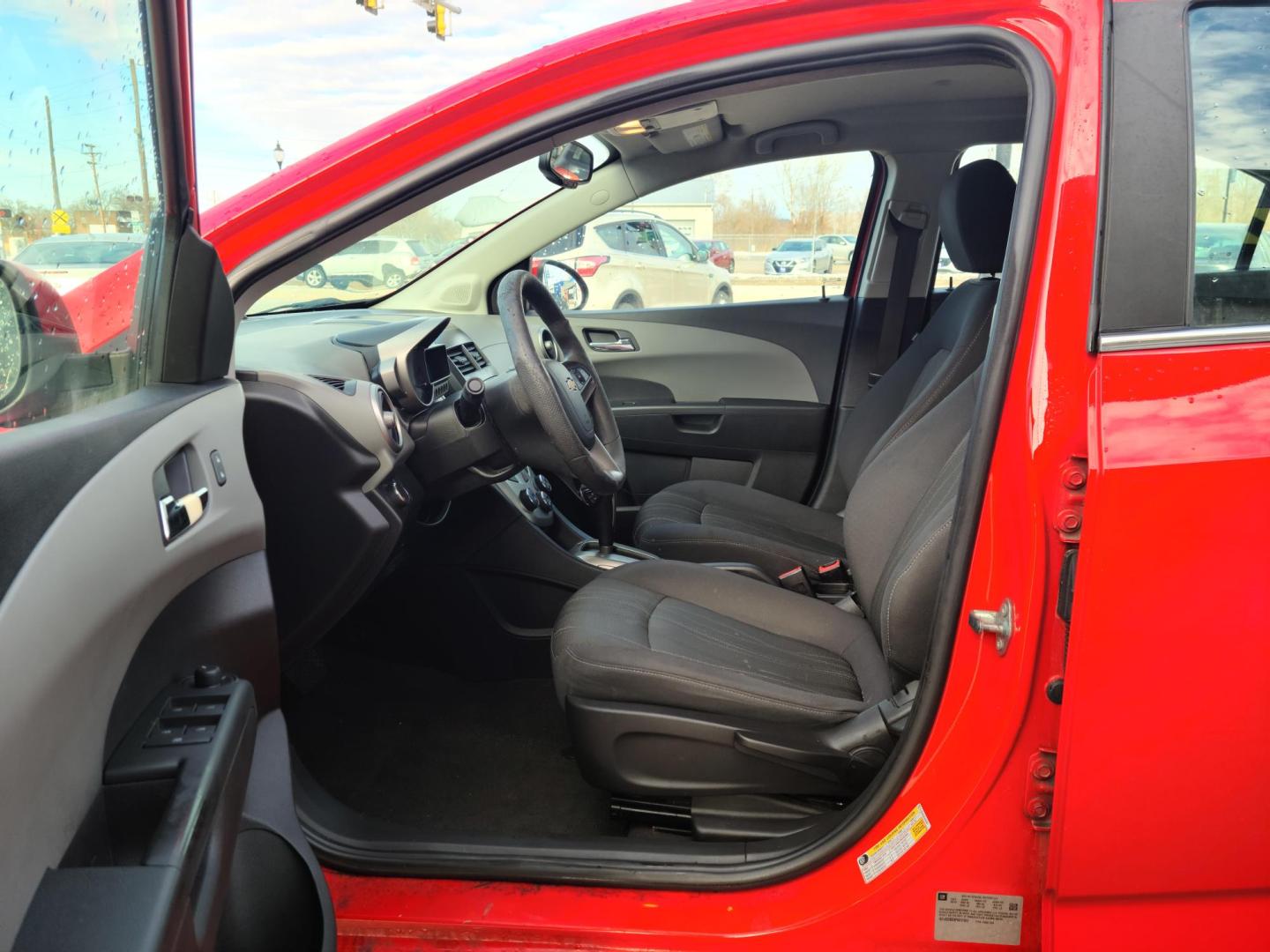 2015 Red Hot /Jet Black/ Brick Chevrolet Sonic LT Auto Sedan (1G1JC5SG3F4) with an 1.8L L4 DOHC 24V engine, 6-Speed Automatic transmission, located at 104 1st Avenue, Silvis, IL, 61282, (309) 755-9511, 41.515156, -90.425377 - Photo#6