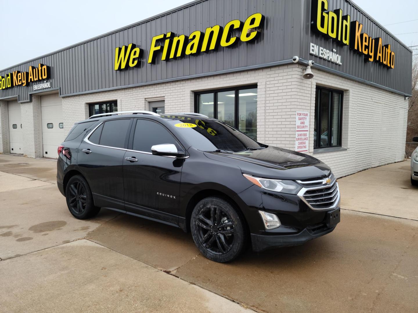 2018 Mosaic Black Metallic /Jet Black/Cinnamon, Cloth Chevrolet Equinox Premier LT 2WD (2GNAXMEVXJ6) with an 1.5L L4 DIR DOHC 16V TURBO engine, 6A transmission, located at 104 1st Avenue, Silvis, IL, 61282, (309) 755-9511, 41.515156, -90.425377 - Photo#0