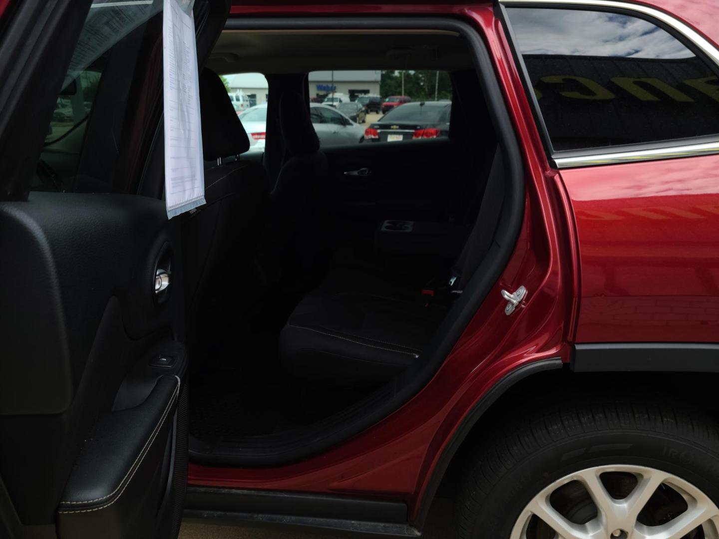 2015 DP Cherry Red Crystal PC /Black Jeep Cherokee Latitude FWD (1C4PJLCS1FW) with an 3.2L V6 DOHC 24V engine, 9-Speed Automatic transmission, located at 104 1st Avenue, Silvis, IL, 61282, (309) 755-9511, 41.515156, -90.425377 - Photo#5