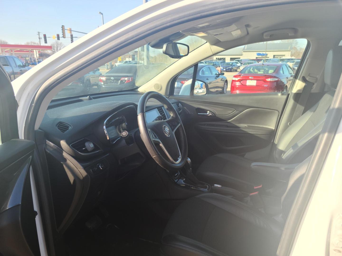 2017 /Black Buick Encore Preferred AWD (KL4CJESB9HB) with an 1.4L L4 DOHC 16V TURBO engine, 6A transmission, located at 104 1st Avenue, Silvis, IL, 61282, (309) 755-9511, 41.515156, -90.425377 - Photo#5
