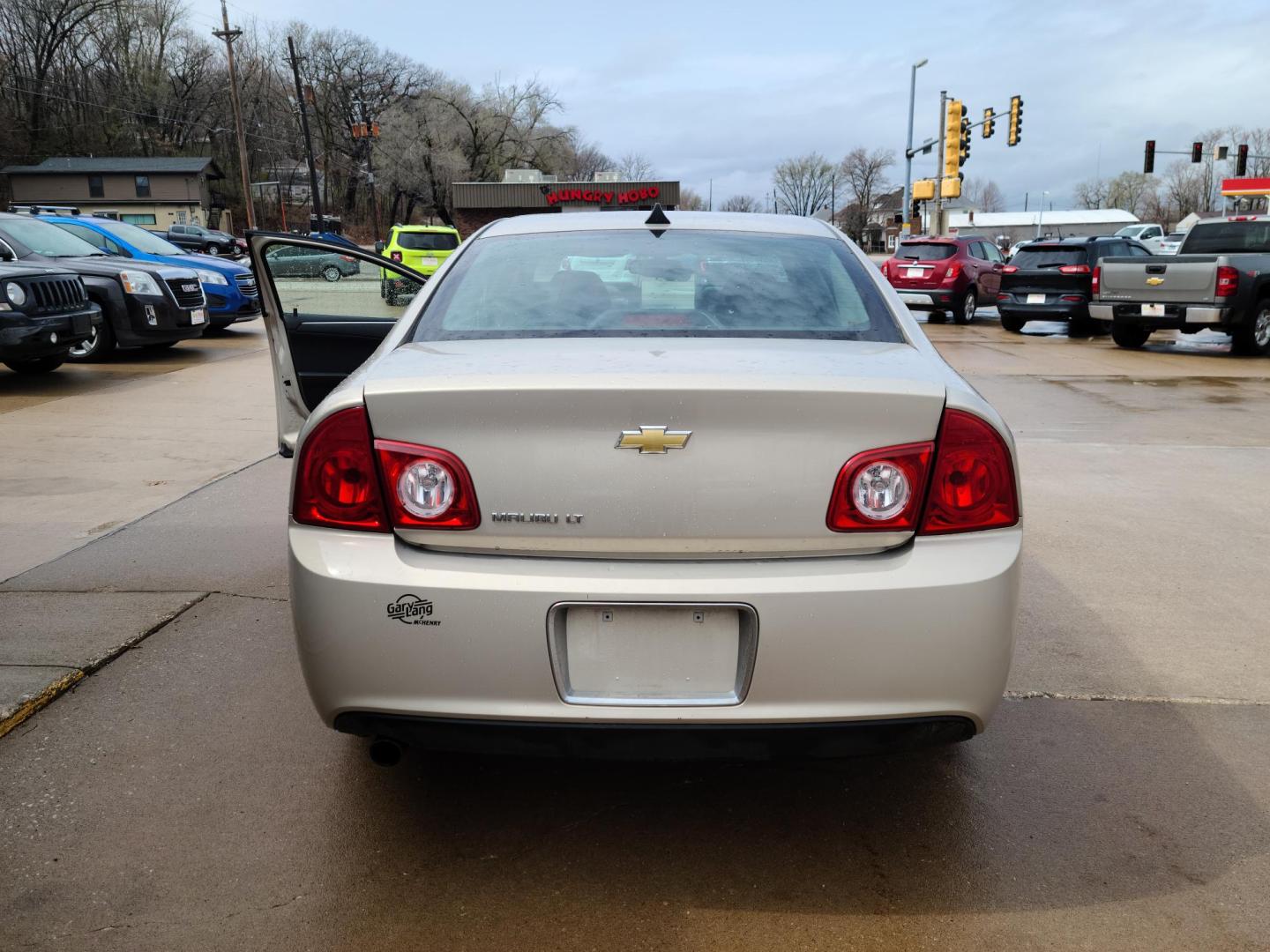2012 /Black Chevrolet Malibu 1LT (1G1ZC5E09CF) with an 2.4L L4 DOHC 16V engine, 6-Speed Automatic transmission, located at 104 1st Avenue, Silvis, IL, 61282, (309) 755-9511, 41.515156, -90.425377 - Photo#2