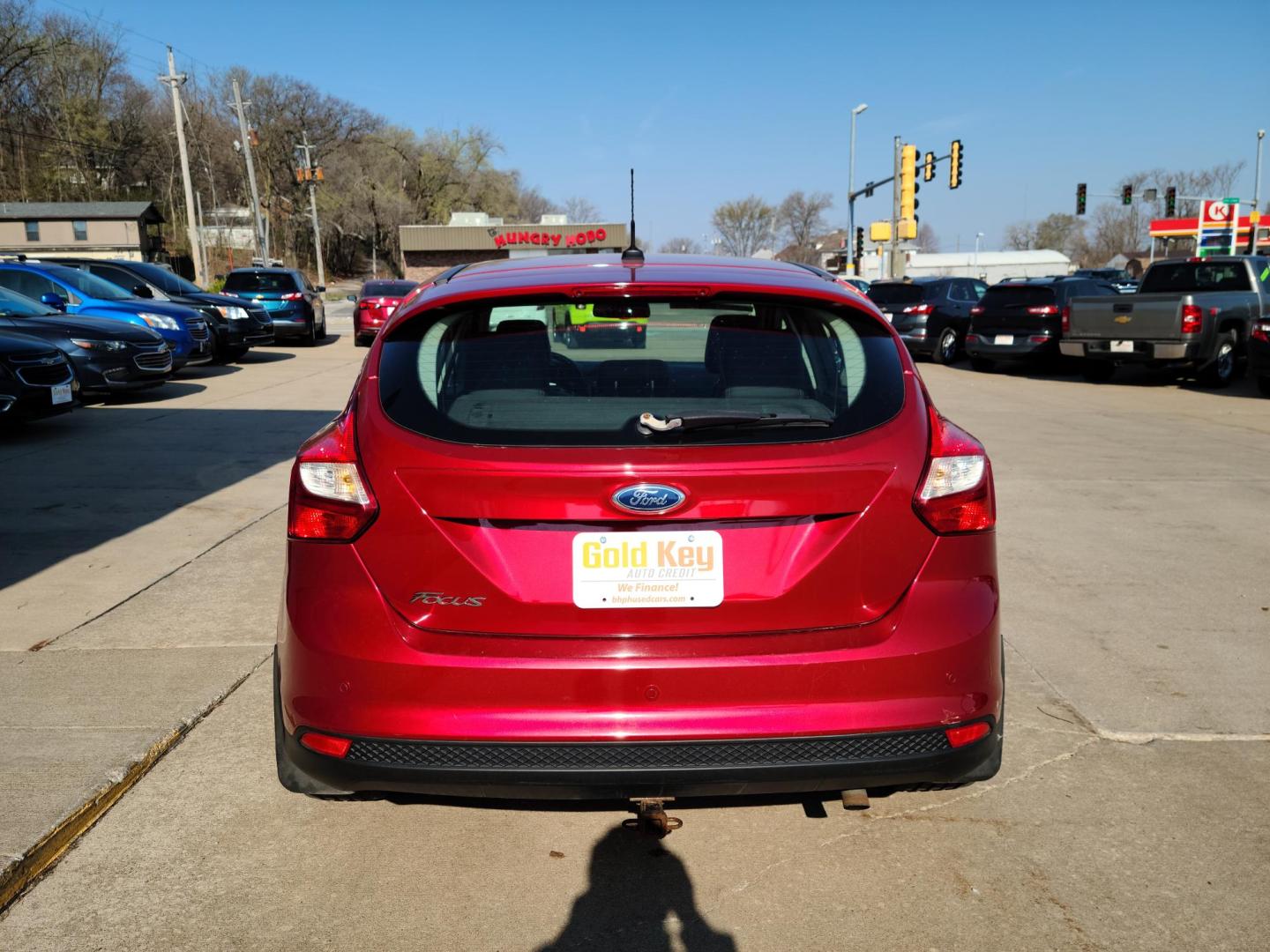 2012 Ruby Red Metallic Tinted Clearcoat /Black Ford Focus SEL (1FAHP3M24CL) with an 2.0L L4 DOHC 16V engine, 6-Speed Automatic transmission, located at 104 1st Avenue, Silvis, IL, 61282, (309) 755-9511, 41.515156, -90.425377 - Photo#2