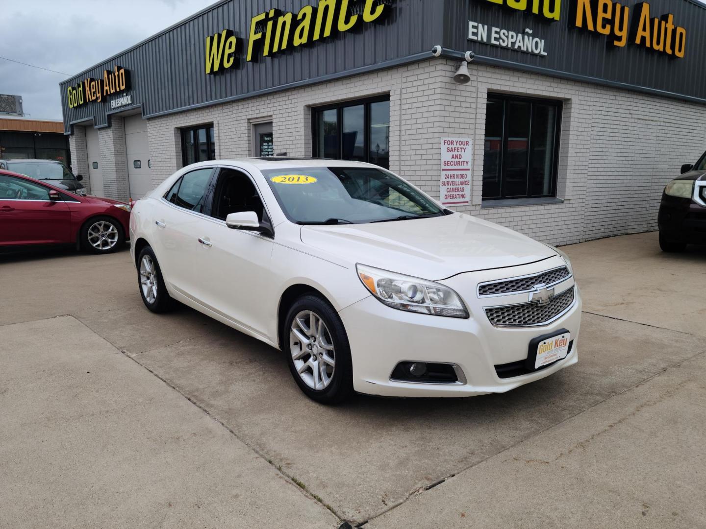 2013 Chevrolet Malibu LTZ (1G11J5SX5DF) with an 2.0L L4 DOHC 16V engine, 6-Speed Automatic transmission, located at 104 1st Avenue, Silvis, IL, 61282, (309) 755-9511, 41.515156, -90.425377 - Photo#0