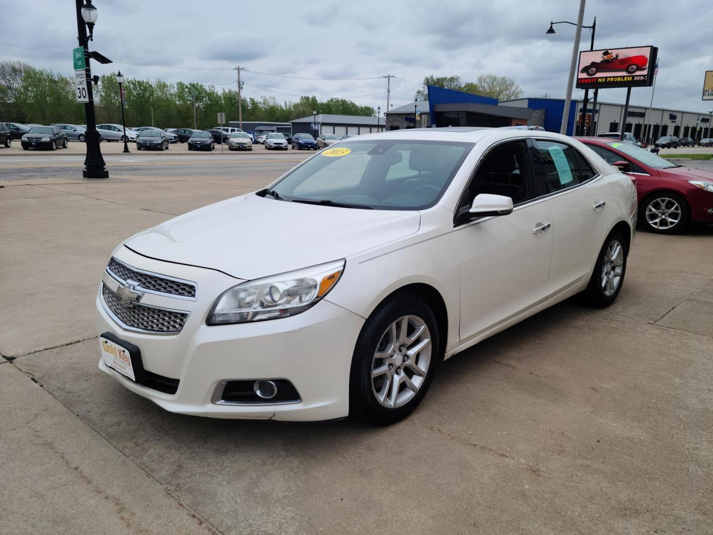 2013 Chevrolet Malibu LTZ (1G11J5SX5DF) with an 2.0L L4 DOHC 16V engine, 6-Speed Automatic transmission, located at 104 1st Avenue, Silvis, IL, 61282, (309) 755-9511, 41.515156, -90.425377 - Photo#1