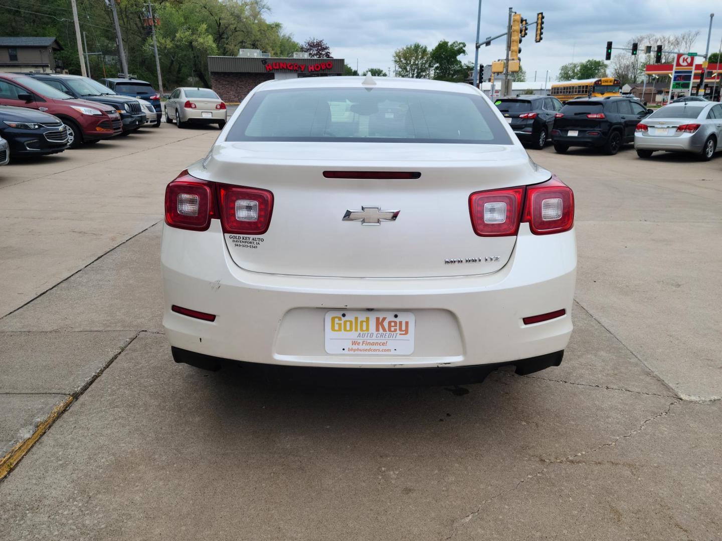2013 Chevrolet Malibu LTZ (1G11J5SX5DF) with an 2.0L L4 DOHC 16V engine, 6-Speed Automatic transmission, located at 104 1st Avenue, Silvis, IL, 61282, (309) 755-9511, 41.515156, -90.425377 - Photo#2