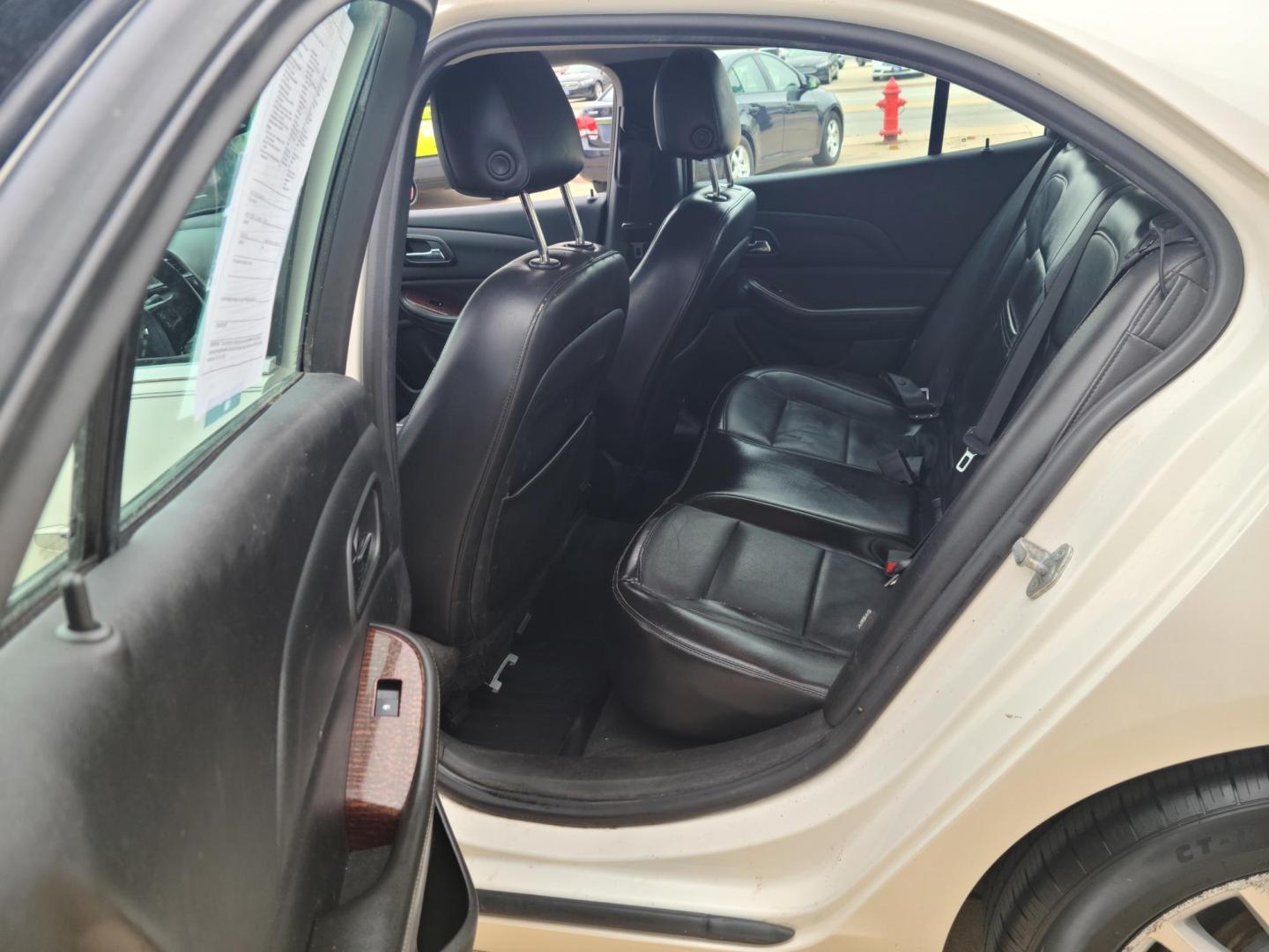 2013 Chevrolet Malibu LTZ (1G11J5SX5DF) with an 2.0L L4 DOHC 16V engine, 6-Speed Automatic transmission, located at 104 1st Avenue, Silvis, IL, 61282, (309) 755-9511, 41.515156, -90.425377 - Photo#4