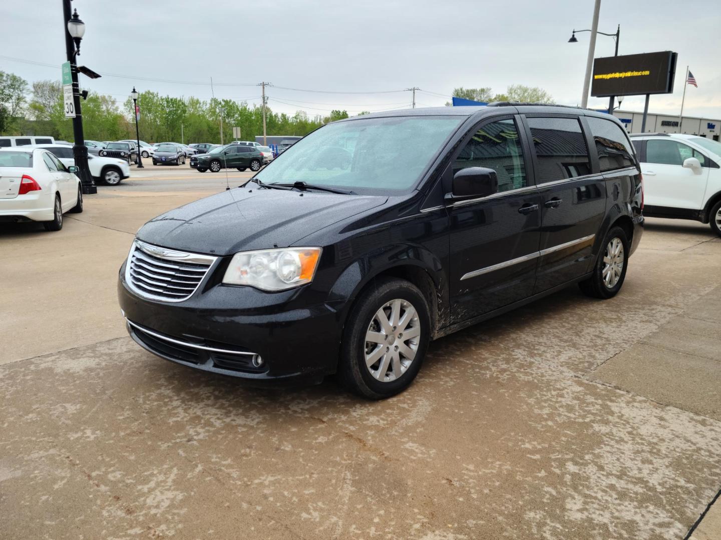 2014 Carbon Black Metallic Chrysler Town & Country Touring (2C4RC1BG9ER) with an 3.6L V6 DOHC 24V engine, 6-Speed Automatic transmission, located at 104 1st Avenue, Silvis, IL, 61282, (309) 755-9511, 41.515156, -90.425377 - Photo#1