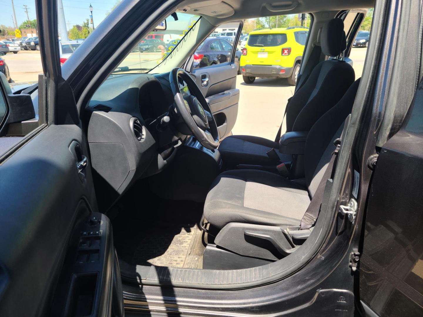 2015 Gray Jeep Patriot Latitude 4WD (1C4NJRFB2FD) with an 2.4L L4 DOHC 16V engine, Auto transmission, located at 104 1st Avenue, Silvis, IL, 61282, (309) 755-9511, 41.515156, -90.425377 - Photo#5