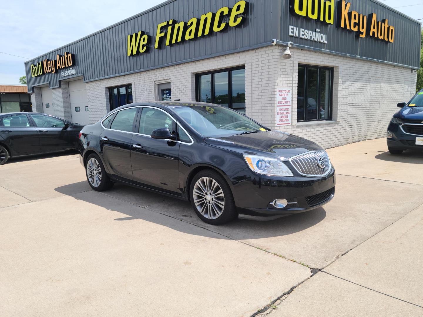 2016 Carbon Black Metallic Buick Verano Leather (1G4PS5SK4G4) with an 2.4L L4 DOHC 16V FFV engine, 6A transmission, located at 104 1st Avenue, Silvis, IL, 61282, (309) 755-9511, 41.515156, -90.425377 - Photo#0