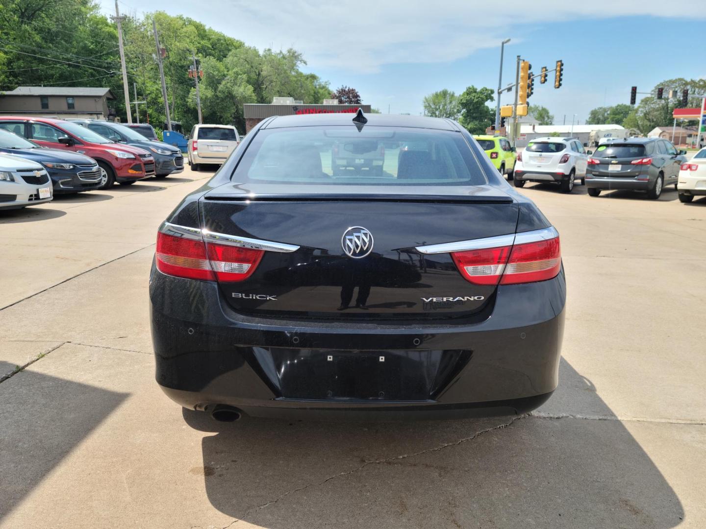 2016 Carbon Black Metallic Buick Verano Leather (1G4PS5SK4G4) with an 2.4L L4 DOHC 16V FFV engine, 6A transmission, located at 104 1st Avenue, Silvis, IL, 61282, (309) 755-9511, 41.515156, -90.425377 - Photo#2