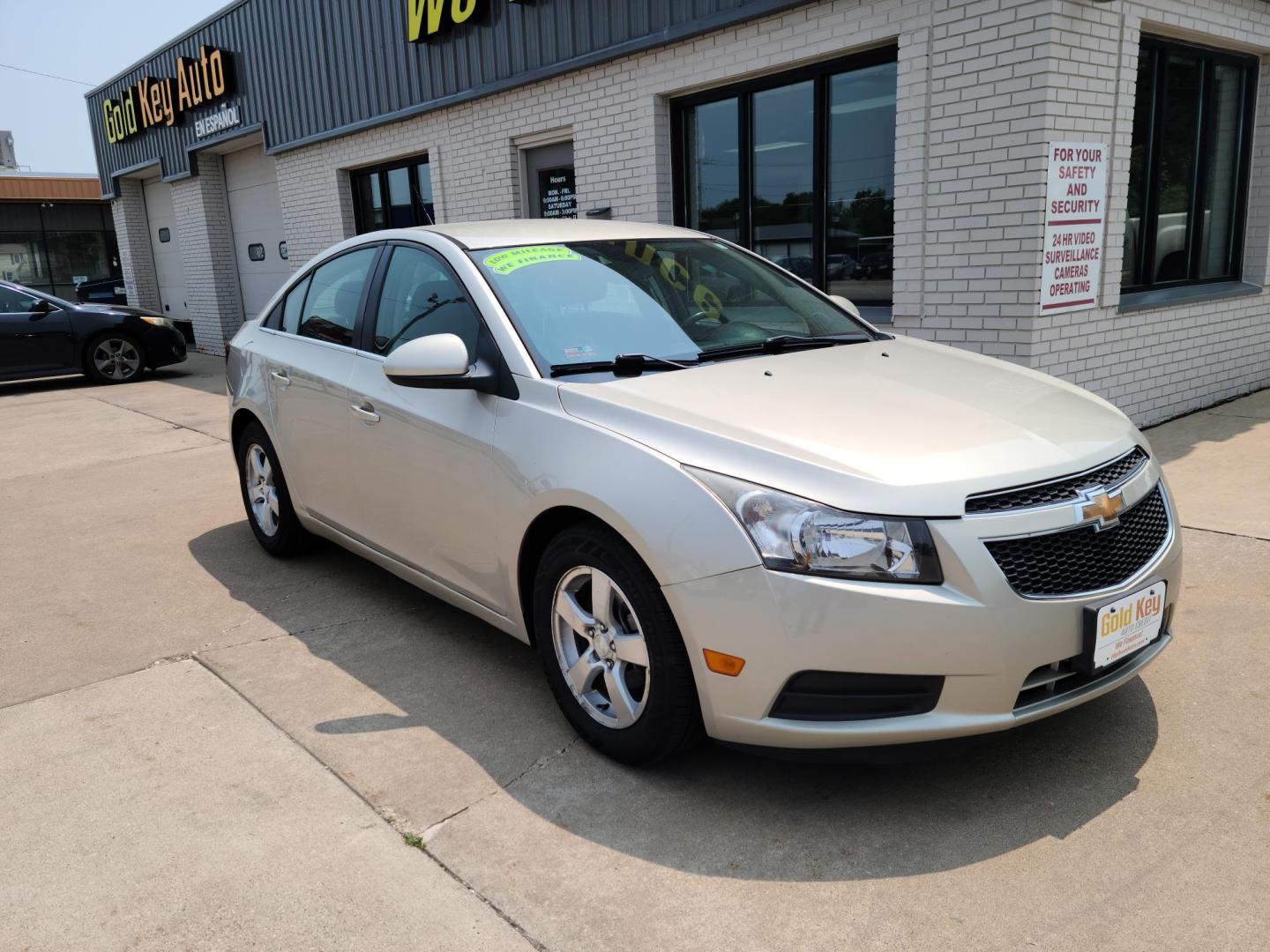 2014 /Black Chevrolet Cruze 1LT Auto (1G1PC5SB3E7) with an 1.4L L4 DOHC 16V TURBO engine, 6-Speed Automatic transmission, located at 104 1st Avenue, Silvis, IL, 61282, (309) 755-9511, 41.515156, -90.425377 - Photo#0