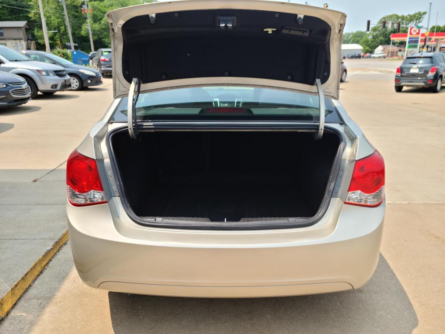 2014 /Black Chevrolet Cruze 1LT Auto (1G1PC5SB3E7) with an 1.4L L4 DOHC 16V TURBO engine, 6-Speed Automatic transmission, located at 104 1st Avenue, Silvis, IL, 61282, (309) 755-9511, 41.515156, -90.425377 - Photo#3