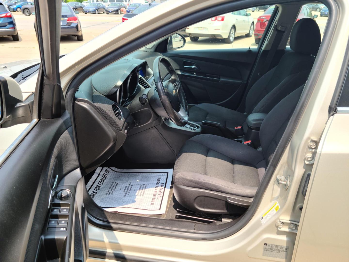 2014 /Black Chevrolet Cruze 1LT Auto (1G1PC5SB3E7) with an 1.4L L4 DOHC 16V TURBO engine, 6-Speed Automatic transmission, located at 104 1st Avenue, Silvis, IL, 61282, (309) 755-9511, 41.515156, -90.425377 - Photo#5
