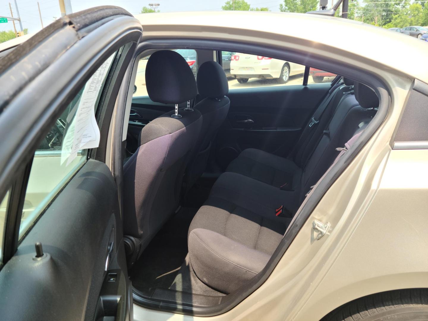 2014 /Black Chevrolet Cruze 1LT Auto (1G1PC5SB3E7) with an 1.4L L4 DOHC 16V TURBO engine, 6-Speed Automatic transmission, located at 104 1st Avenue, Silvis, IL, 61282, (309) 755-9511, 41.515156, -90.425377 - Photo#4
