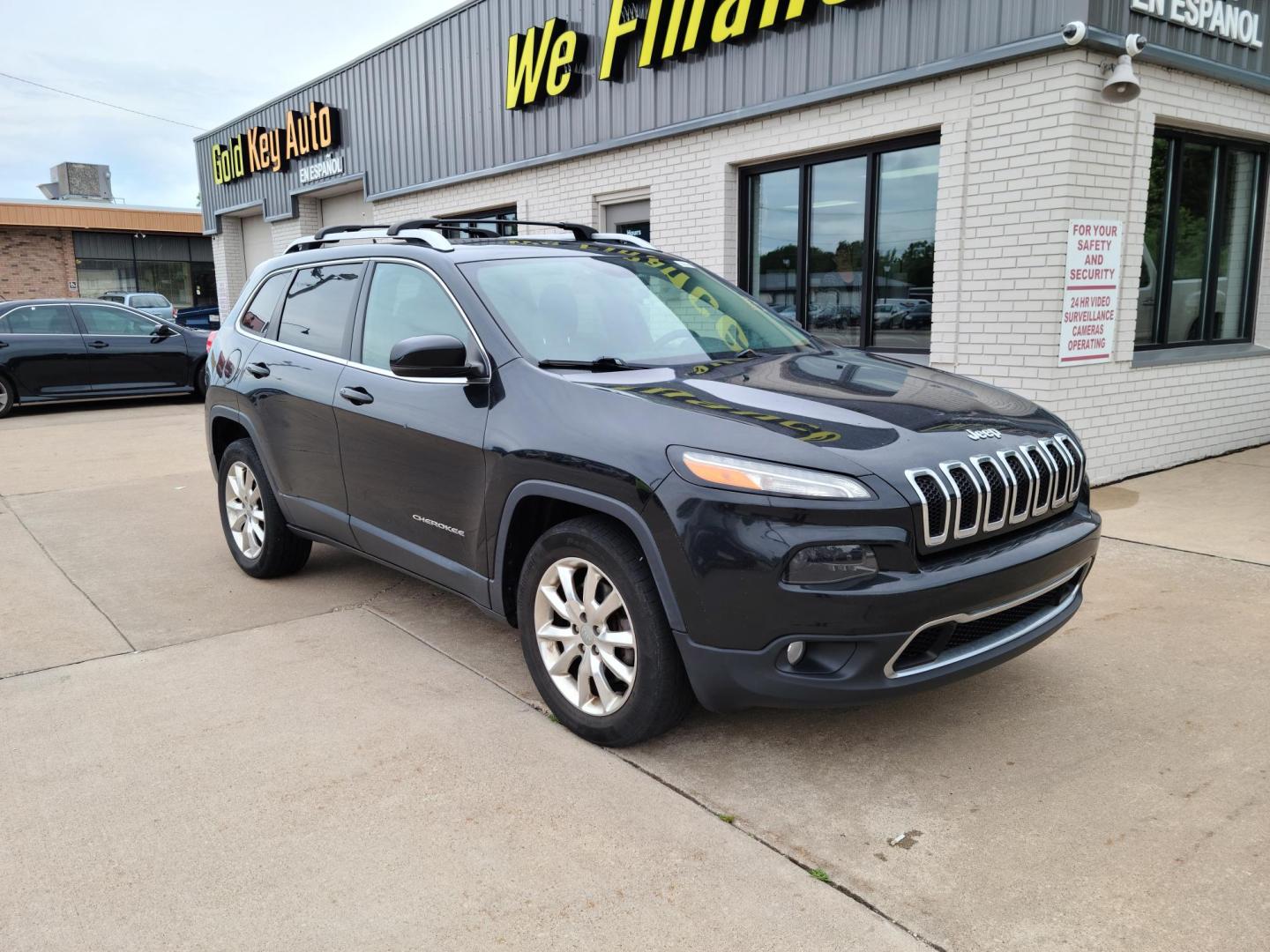 2015 Carbon Black Metallic /Black Jeep Cherokee Limited 4WD (1C4PJMDS7FW) with an 3.2L V6 DOHC 24V engine, 9-Speed Automatic transmission, located at 104 1st Avenue, Silvis, IL, 61282, (309) 755-9511, 41.515156, -90.425377 - Photo#0