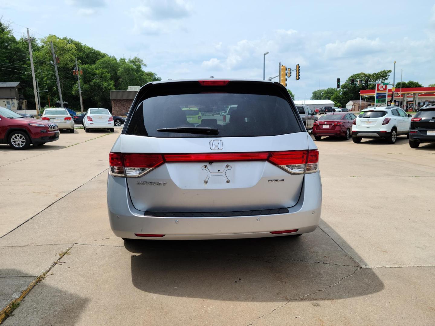 2014 Honda Odyssey Touring (5FNRL5H9XEB) with an 3.5L V6 SOHC 24V engine, 6-Speed Automatic transmission, located at 104 1st Avenue, Silvis, IL, 61282, (309) 755-9511, 41.515156, -90.425377 - Photo#2