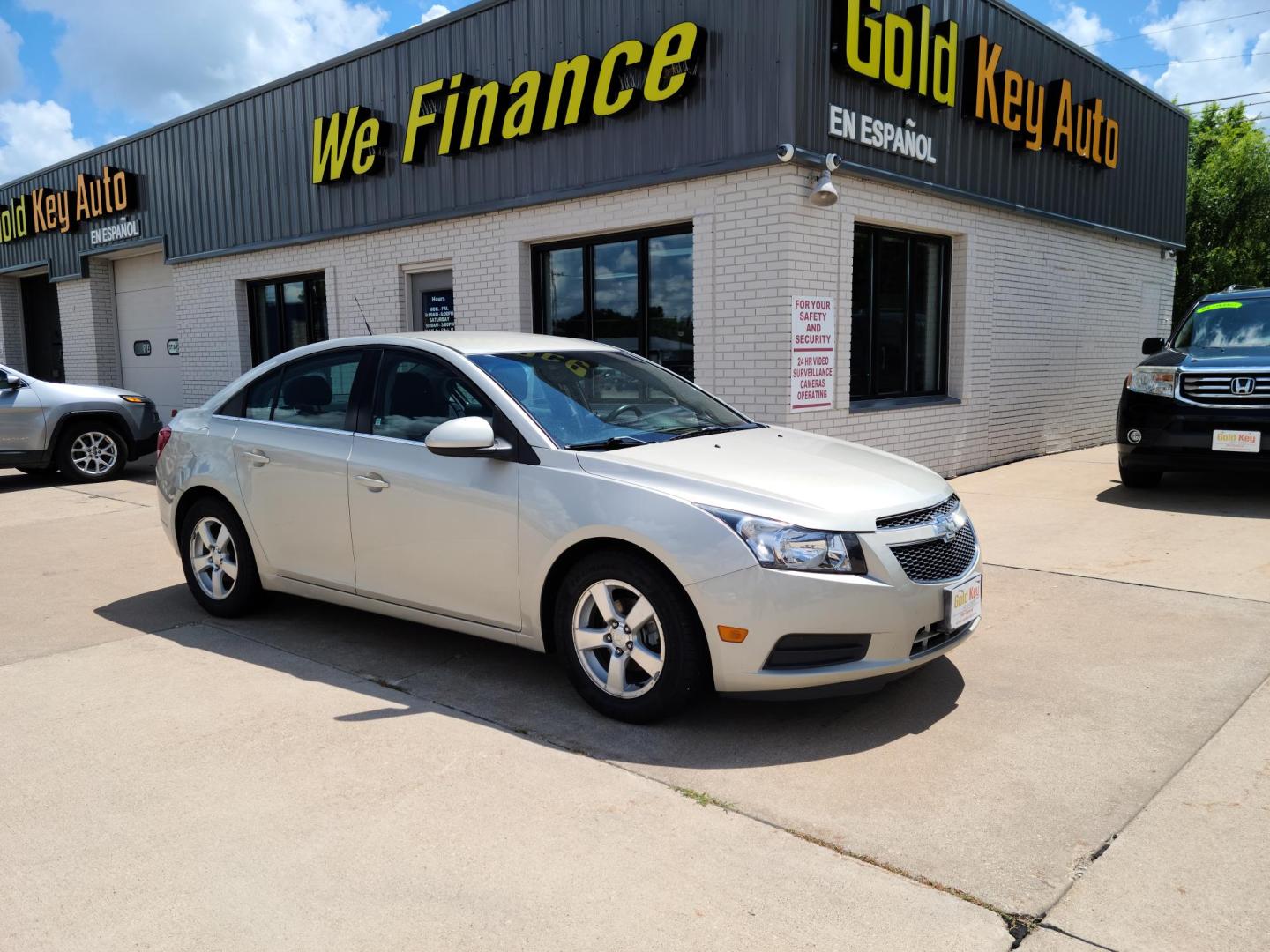 2014 Chevrolet Cruze 1LT Auto (1G1PC5SB9E7) with an 1.4L L4 DOHC 16V TURBO engine, 6-Speed Automatic transmission, located at 104 1st Avenue, Silvis, IL, 61282, (309) 755-9511, 41.515156, -90.425377 - Photo#0
