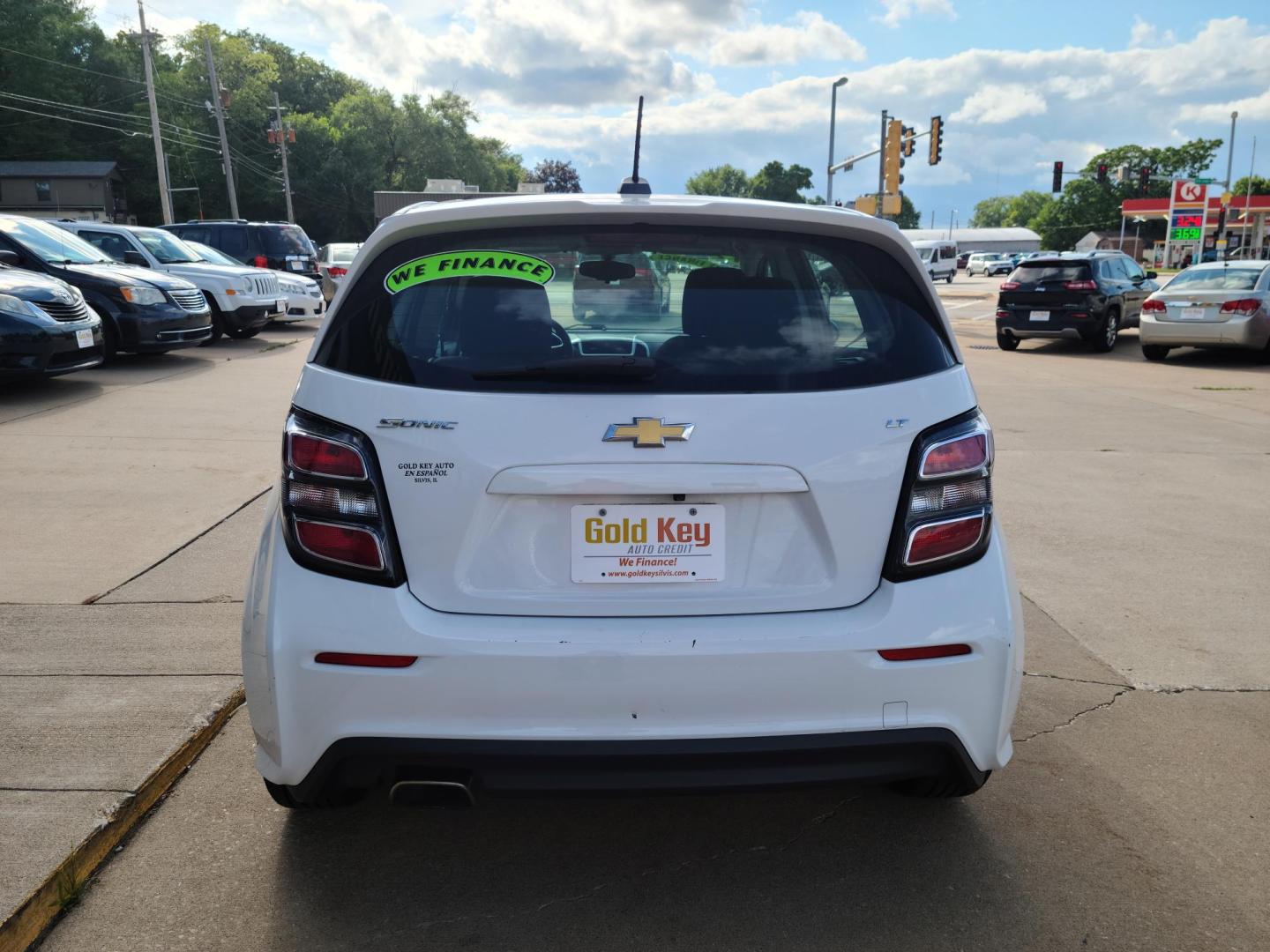 2017 Summit White Chevrolet Sonic RS 5-Door (1G1JD6SH9H4) with an 1.8L L4 DOHC 24V engine, 5A transmission, located at 104 1st Avenue, Silvis, IL, 61282, (309) 755-9511, 41.515156, -90.425377 - Photo#3