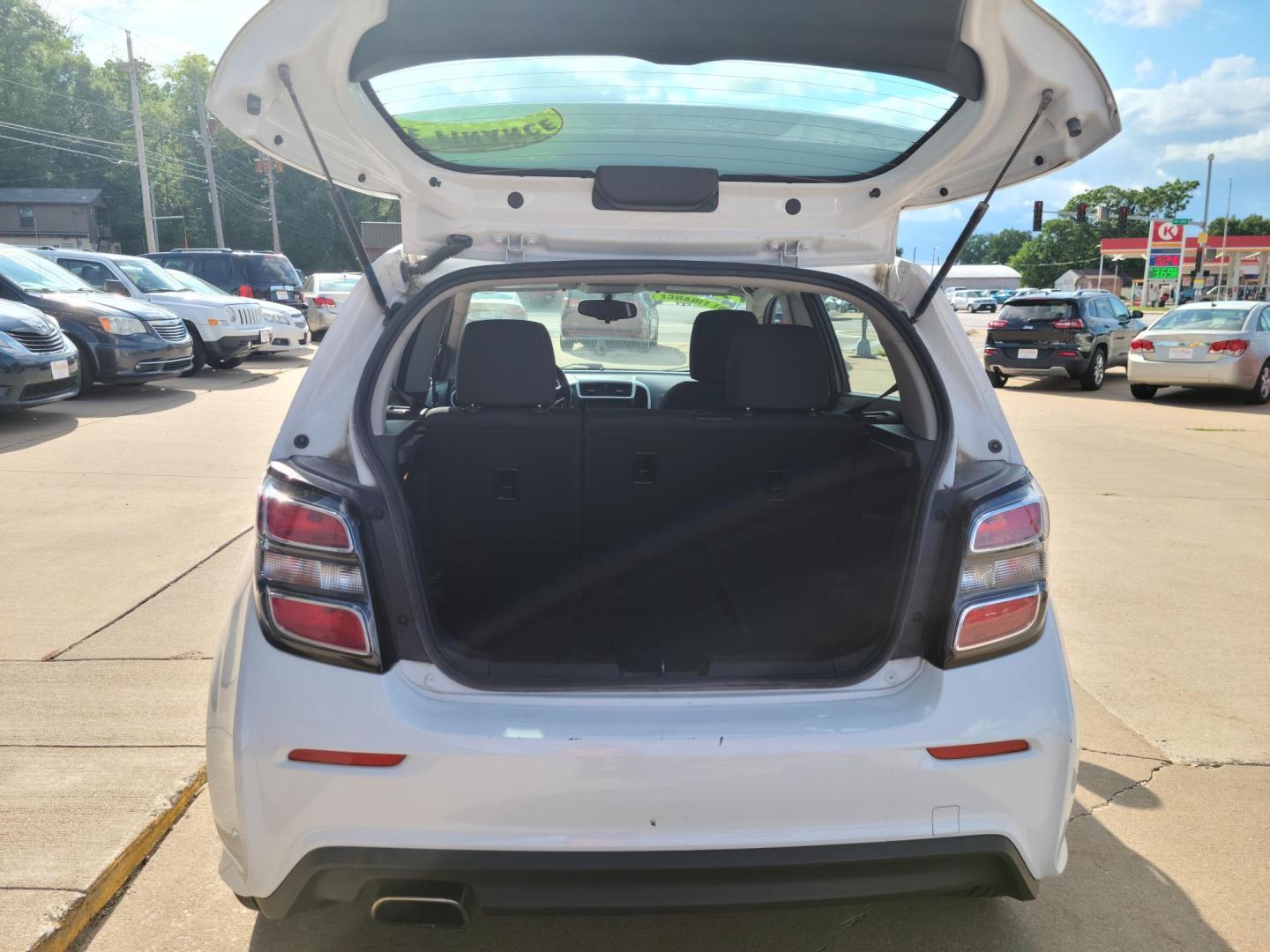 2017 Summit White Chevrolet Sonic RS 5-Door (1G1JD6SH9H4) with an 1.8L L4 DOHC 24V engine, 5A transmission, located at 104 1st Avenue, Silvis, IL, 61282, (309) 755-9511, 41.515156, -90.425377 - Photo#4