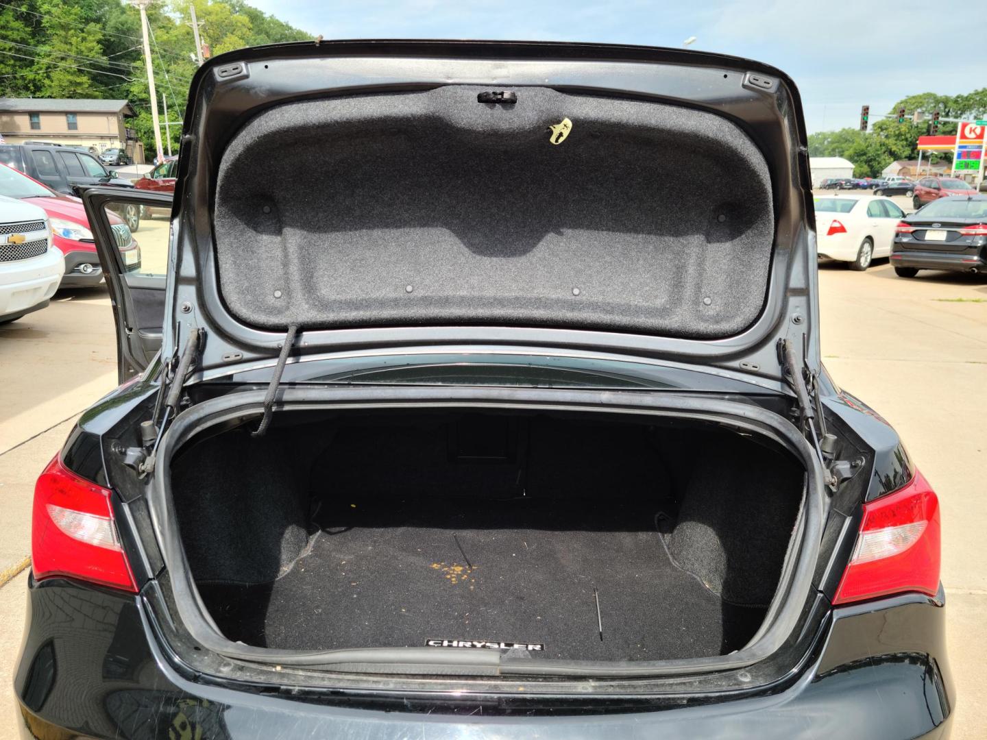2011 Carbon Black Metallic /Black Chrysler 200 S (1C3BC8FG3BN) with an 3.6L V6 DOHC 24V FFV engine, 6-Speed Automatic transmission, located at 104 1st Avenue, Silvis, IL, 61282, (309) 755-9511, 41.515156, -90.425377 - Photo#4