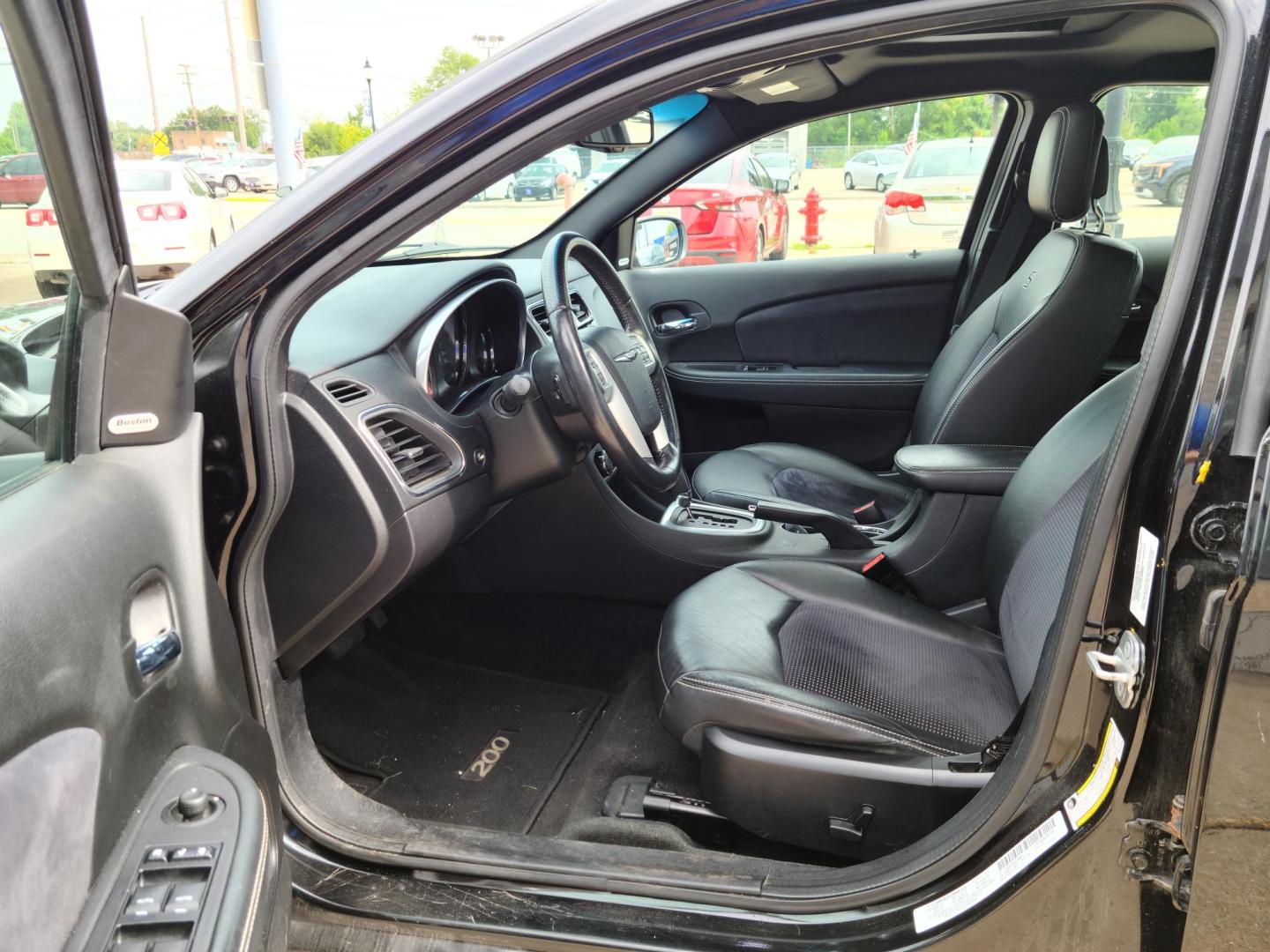 2011 Carbon Black Metallic /Black Chrysler 200 S (1C3BC8FG3BN) with an 3.6L V6 DOHC 24V FFV engine, 6-Speed Automatic transmission, located at 104 1st Avenue, Silvis, IL, 61282, (309) 755-9511, 41.515156, -90.425377 - Photo#6