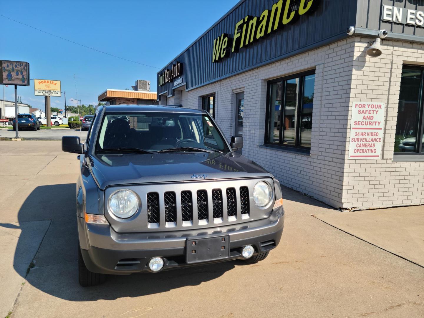 2011 Gray Jeep Patriot 2WD (1J4NT1GA5BD) with an 2.0L L4 DOHC 16V engine, Auto transmission, located at 104 1st Avenue, Silvis, IL, 61282, (309) 755-9511, 41.515156, -90.425377 - Photo#1