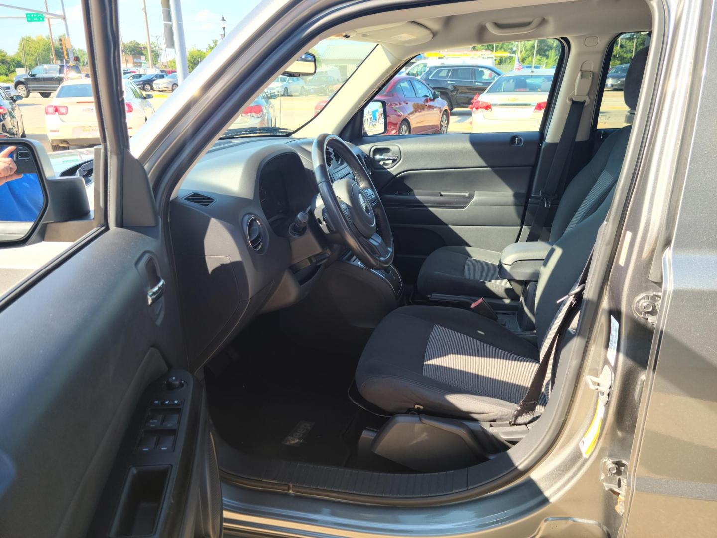 2011 Gray Jeep Patriot 2WD (1J4NT1GA5BD) with an 2.0L L4 DOHC 16V engine, Auto transmission, located at 104 1st Avenue, Silvis, IL, 61282, (309) 755-9511, 41.515156, -90.425377 - Photo#6