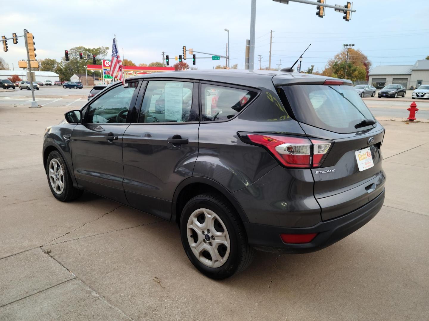 2017 Ford Escape S FWD (1FMCU0F78HU) with an 2.5L L4 DOHC 16V engine, 6A transmission, located at 104 1st Avenue, Silvis, IL, 61282, (309) 755-9511, 41.515156, -90.425377 - Photo#2