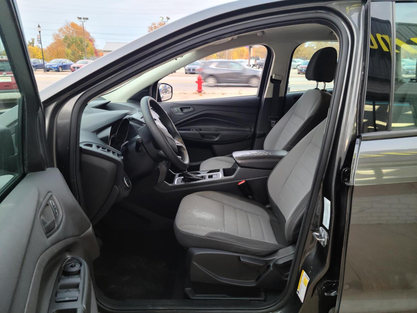 2017 Ford Escape S FWD (1FMCU0F78HU) with an 2.5L L4 DOHC 16V engine, 6A transmission, located at 104 1st Avenue, Silvis, IL, 61282, (309) 755-9511, 41.515156, -90.425377 - Photo#6