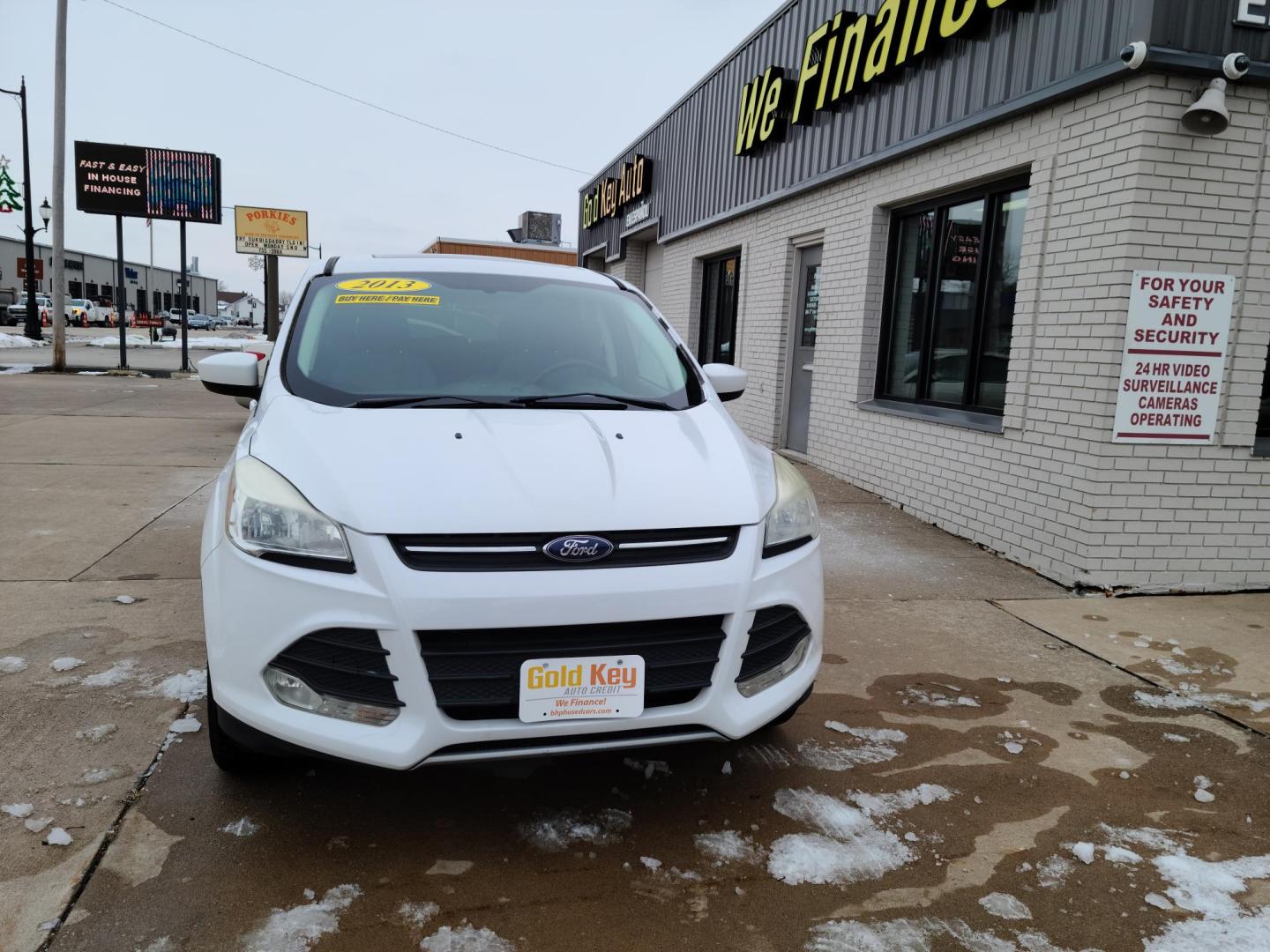 2014 Ford Escape SE 4WD (1FMCU9GX9EU) with an 1.6L L4 DOHC 16V engine, 6-Speed Automatic transmission, located at 104 1st Avenue, Silvis, IL, 61282, (309) 755-9511, 41.515156, -90.425377 - Photo#1