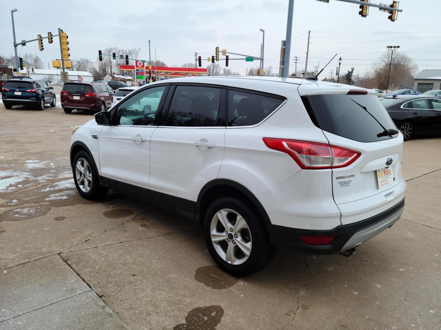 2014 Ford Escape SE 4WD (1FMCU9GX9EU) with an 1.6L L4 DOHC 16V engine, 6-Speed Automatic transmission, located at 104 1st Avenue, Silvis, IL, 61282, (309) 755-9511, 41.515156, -90.425377 - Photo#2