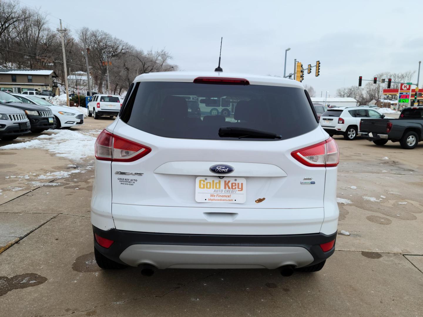 2014 Ford Escape SE 4WD (1FMCU9GX9EU) with an 1.6L L4 DOHC 16V engine, 6-Speed Automatic transmission, located at 104 1st Avenue, Silvis, IL, 61282, (309) 755-9511, 41.515156, -90.425377 - Photo#3