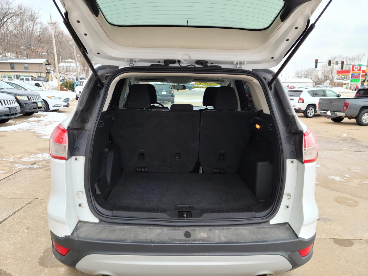 2014 Ford Escape SE 4WD (1FMCU9GX9EU) with an 1.6L L4 DOHC 16V engine, 6-Speed Automatic transmission, located at 104 1st Avenue, Silvis, IL, 61282, (309) 755-9511, 41.515156, -90.425377 - Photo#4