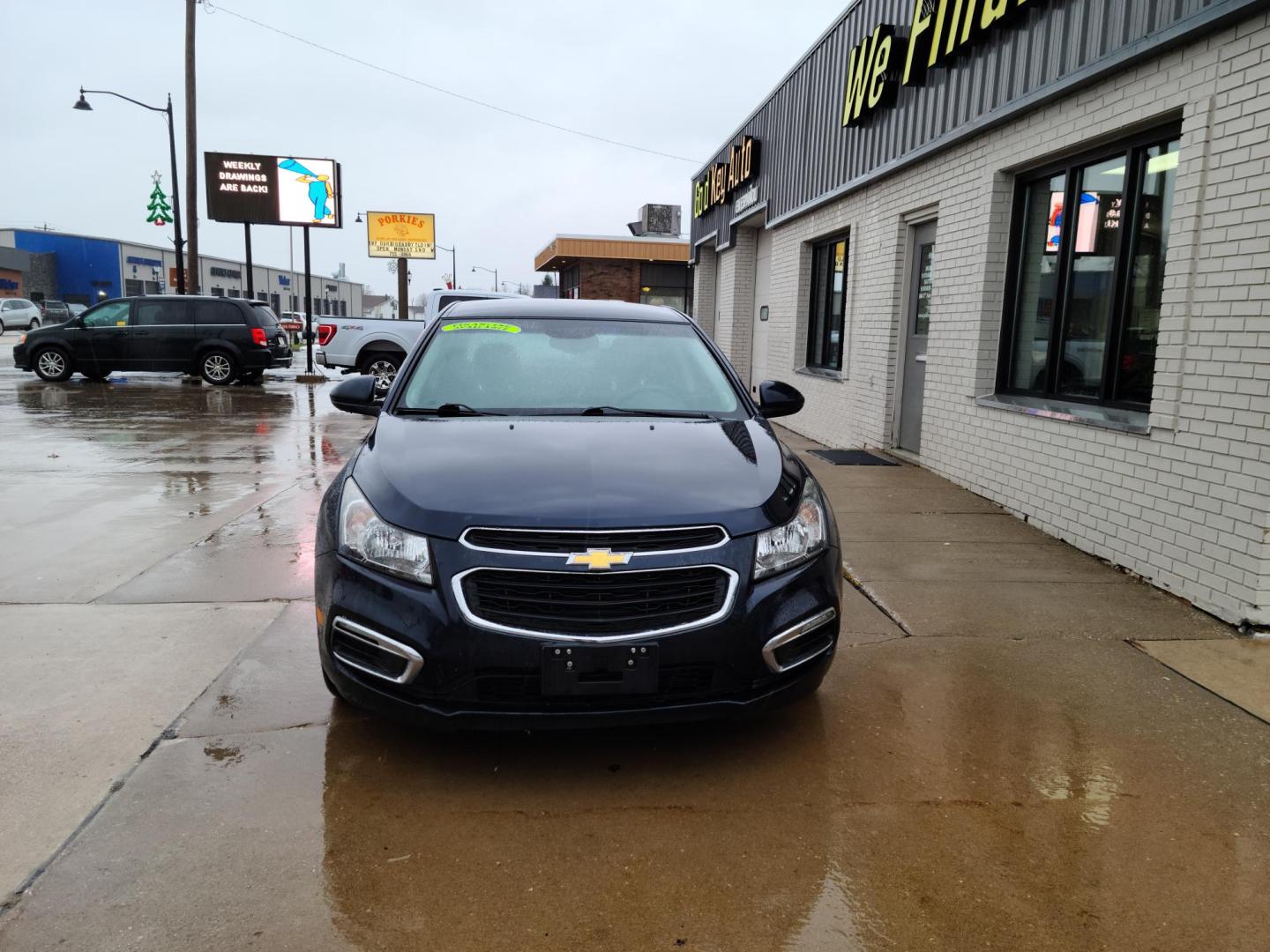 2015 Chevrolet Cruze 1LT Auto (1G1PC5SB0F7) with an 1.4L L4 DOHC 16V TURBO engine, 6-Speed Automatic transmission, located at 104 1st Avenue, Silvis, IL, 61282, (309) 755-9511, 41.515156, -90.425377 - Photo#1