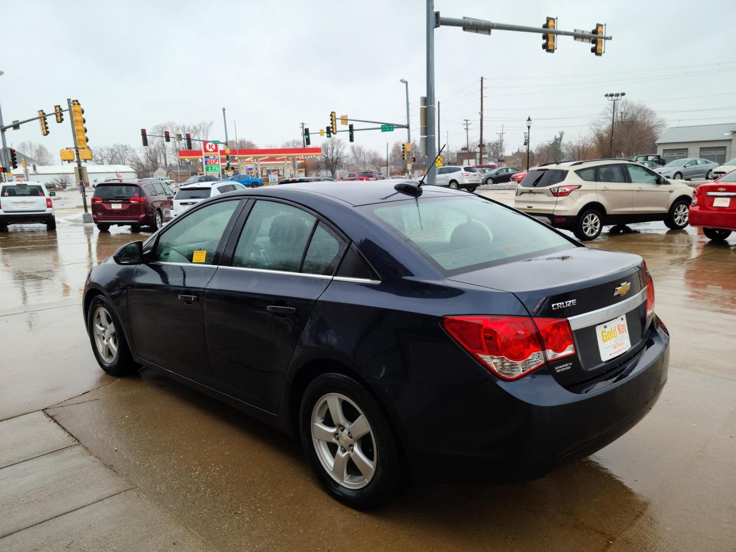 2015 Chevrolet Cruze 1LT Auto (1G1PC5SB0F7) with an 1.4L L4 DOHC 16V TURBO engine, 6-Speed Automatic transmission, located at 104 1st Avenue, Silvis, IL, 61282, (309) 755-9511, 41.515156, -90.425377 - Photo#2