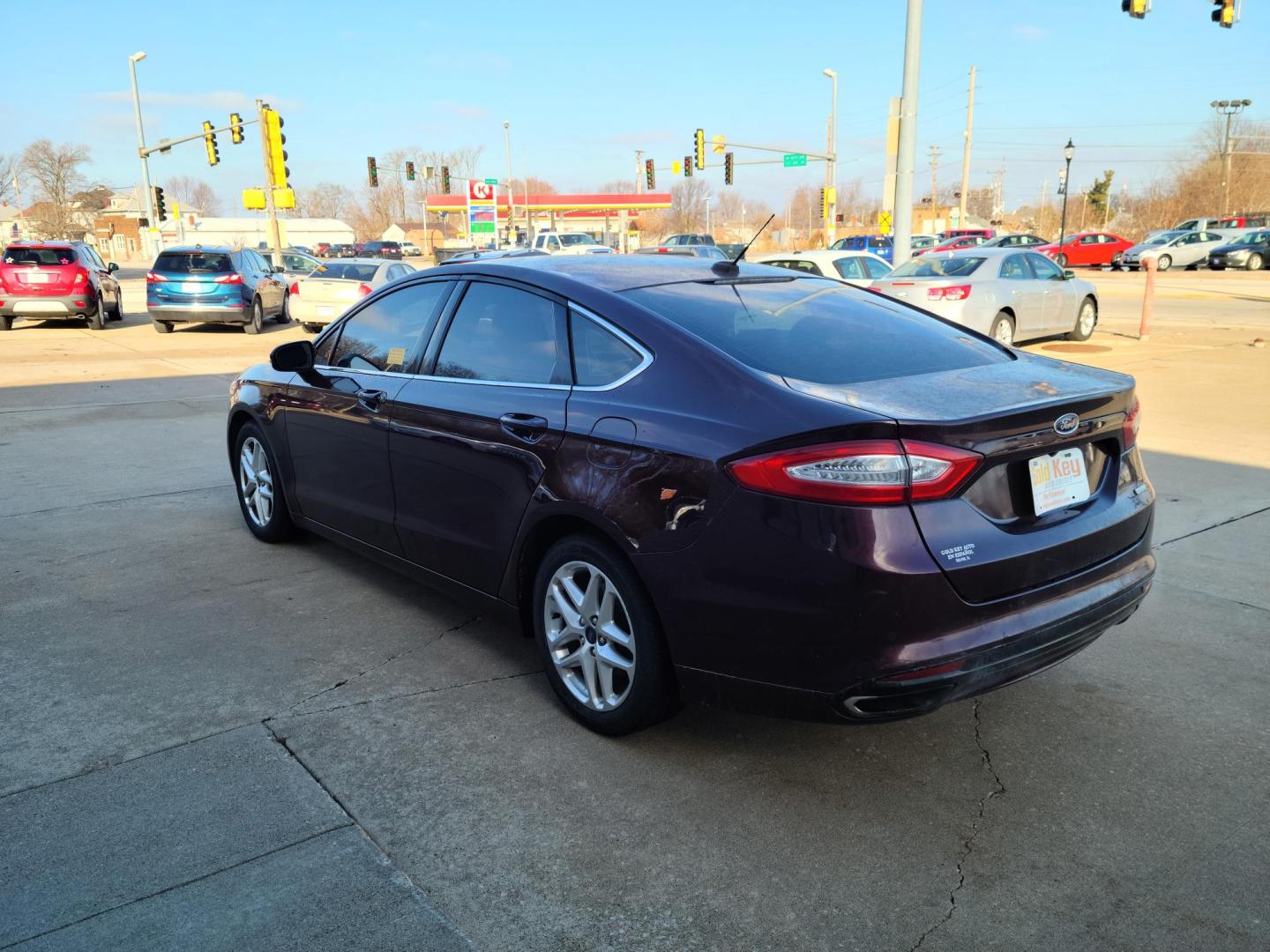 2013 /Black Ford Fusion SE (3FA6P0H9XDR) with an 2.0L L4 DOHC 16V engine, auto transmission, located at 104 1st Avenue, Silvis, IL, 61282, (309) 755-9511, 41.515156, -90.425377 - Photo#2
