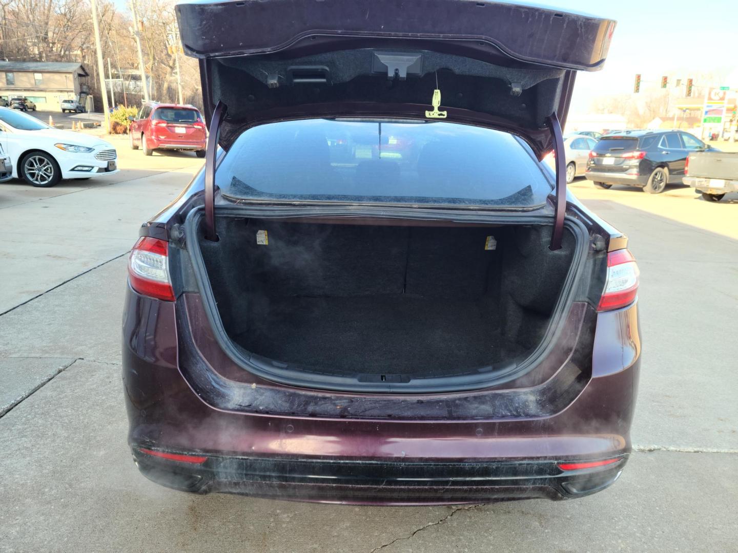 2013 /Black Ford Fusion SE (3FA6P0H9XDR) with an 2.0L L4 DOHC 16V engine, auto transmission, located at 104 1st Avenue, Silvis, IL, 61282, (309) 755-9511, 41.515156, -90.425377 - Photo#4
