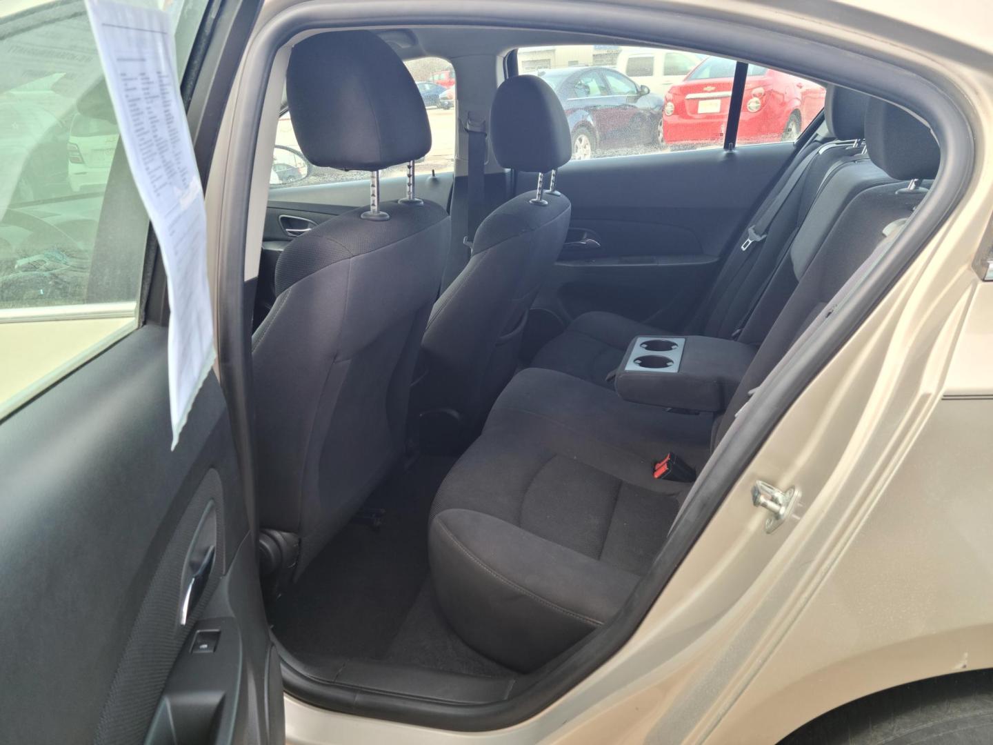 2016 /Black Chevrolet Cruze 2LT Auto (1G1PE5SB6G7) with an 1.4L L4 DOHC 16V TURBO engine, 6-Speed Automatic transmission, located at 104 1st Avenue, Silvis, IL, 61282, (309) 755-9511, 41.515156, -90.425377 - Photo#5