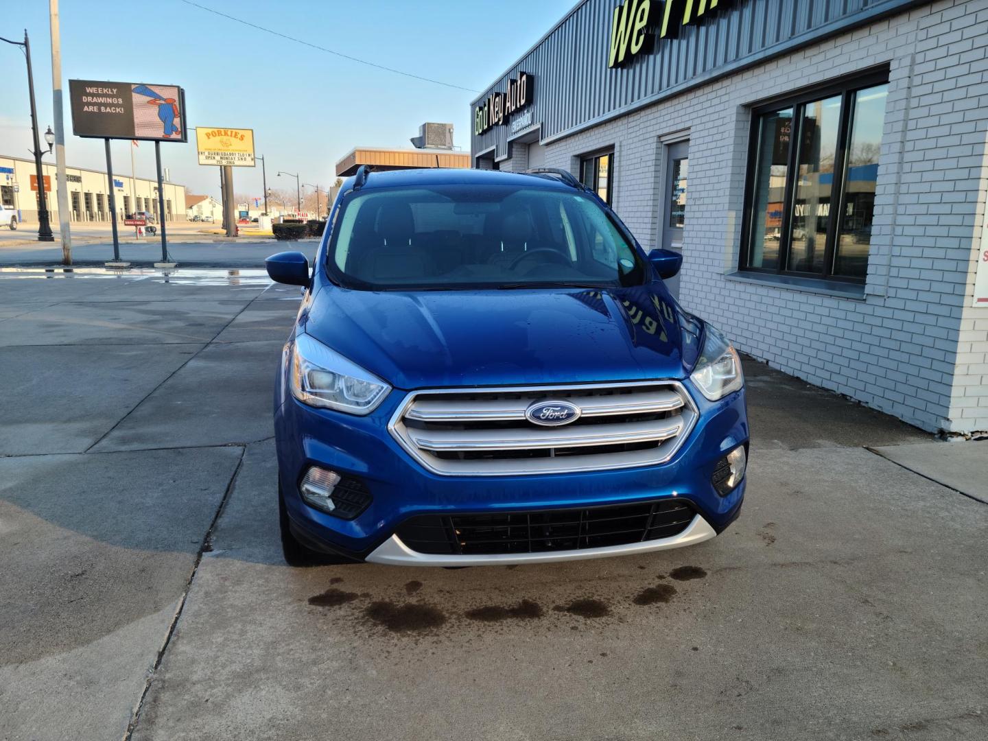 2018 Midnight Blue Metallic Ford Escape SEL 4WD (1FMCU9HDXJU) with an 1.5L L4 DOHC 16V engine, 6A transmission, located at 104 1st Avenue, Silvis, IL, 61282, (309) 755-9511, 41.515156, -90.425377 - Photo#1