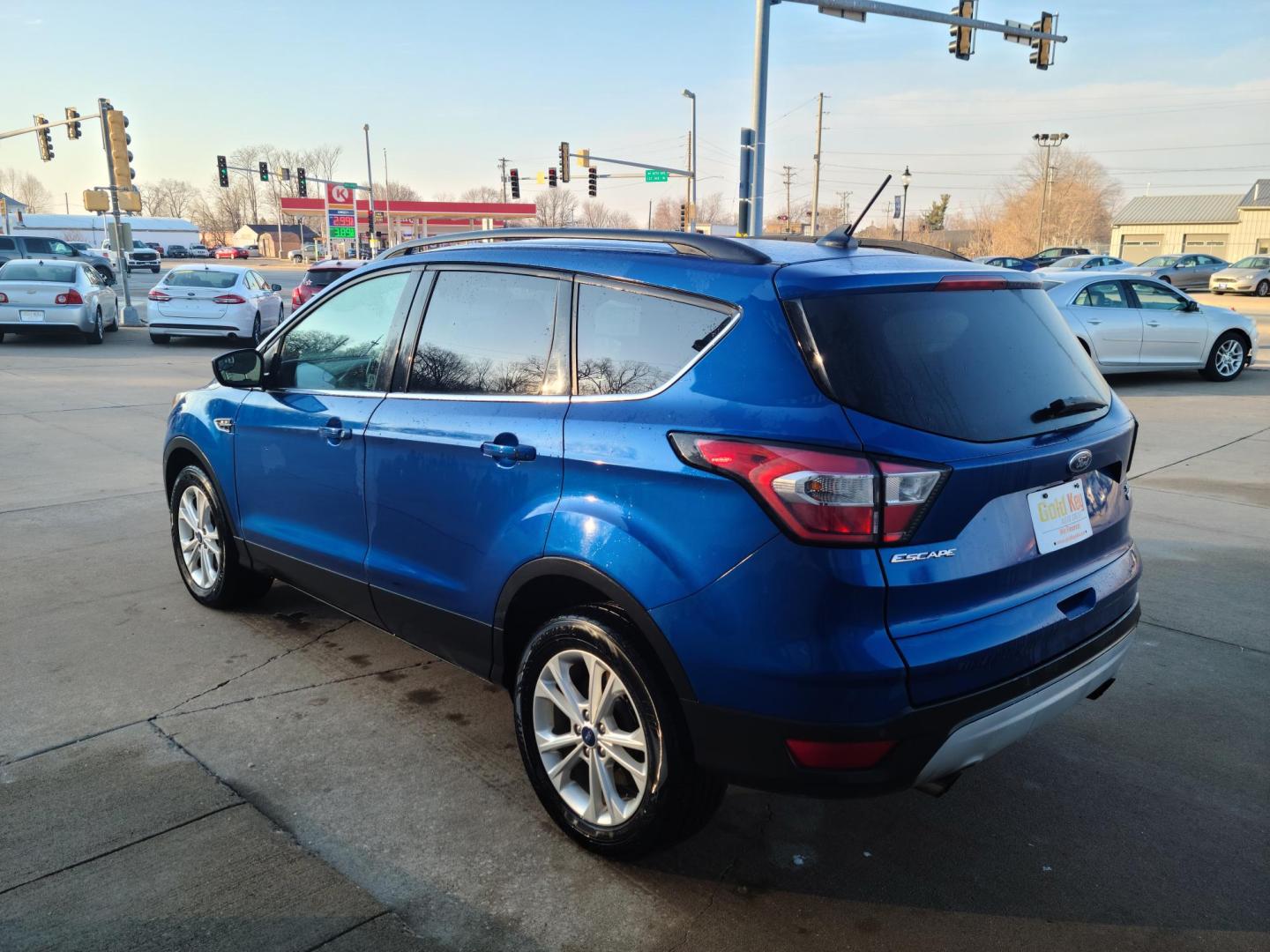 2018 Midnight Blue Metallic Ford Escape SEL 4WD (1FMCU9HDXJU) with an 1.5L L4 DOHC 16V engine, 6A transmission, located at 104 1st Avenue, Silvis, IL, 61282, (309) 755-9511, 41.515156, -90.425377 - Photo#2