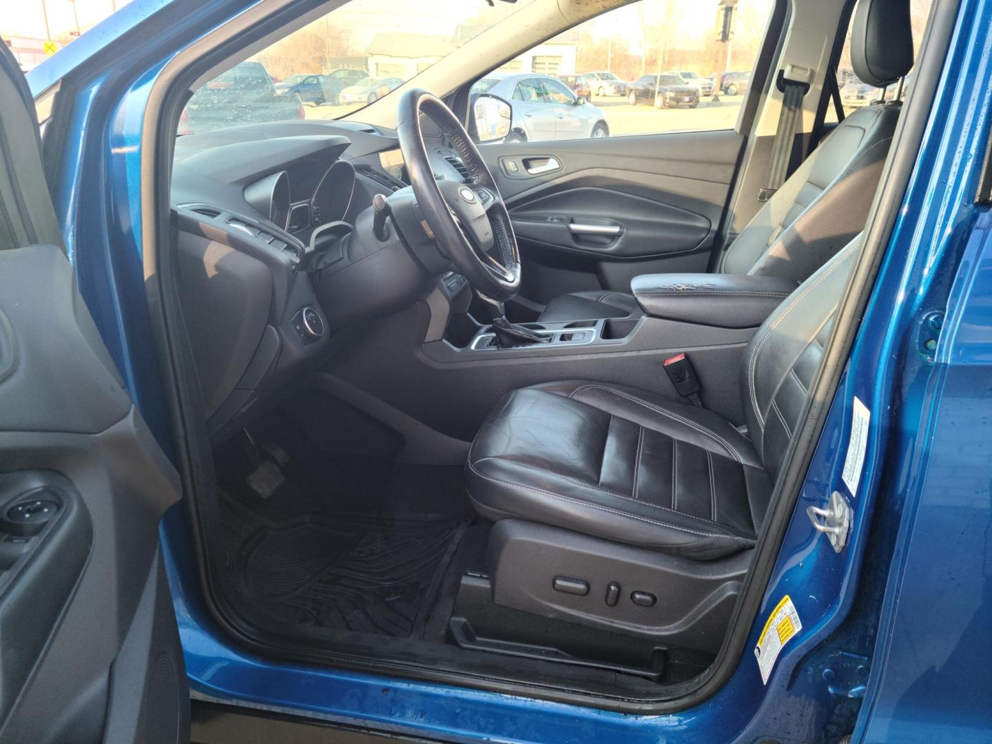 2018 Midnight Blue Metallic Ford Escape SEL 4WD (1FMCU9HDXJU) with an 1.5L L4 DOHC 16V engine, 6A transmission, located at 104 1st Avenue, Silvis, IL, 61282, (309) 755-9511, 41.515156, -90.425377 - Photo#6